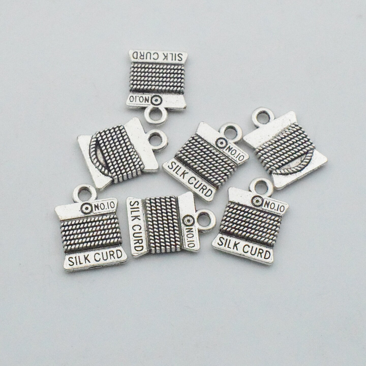 Sewing Charms Collection-100g About (60-65pcs) Antique Silver Craft Supplies Sewing Charms Pendants for Crafting, Jewelry Findings Making Accessory for DIY Necklace Bracelet (M003)