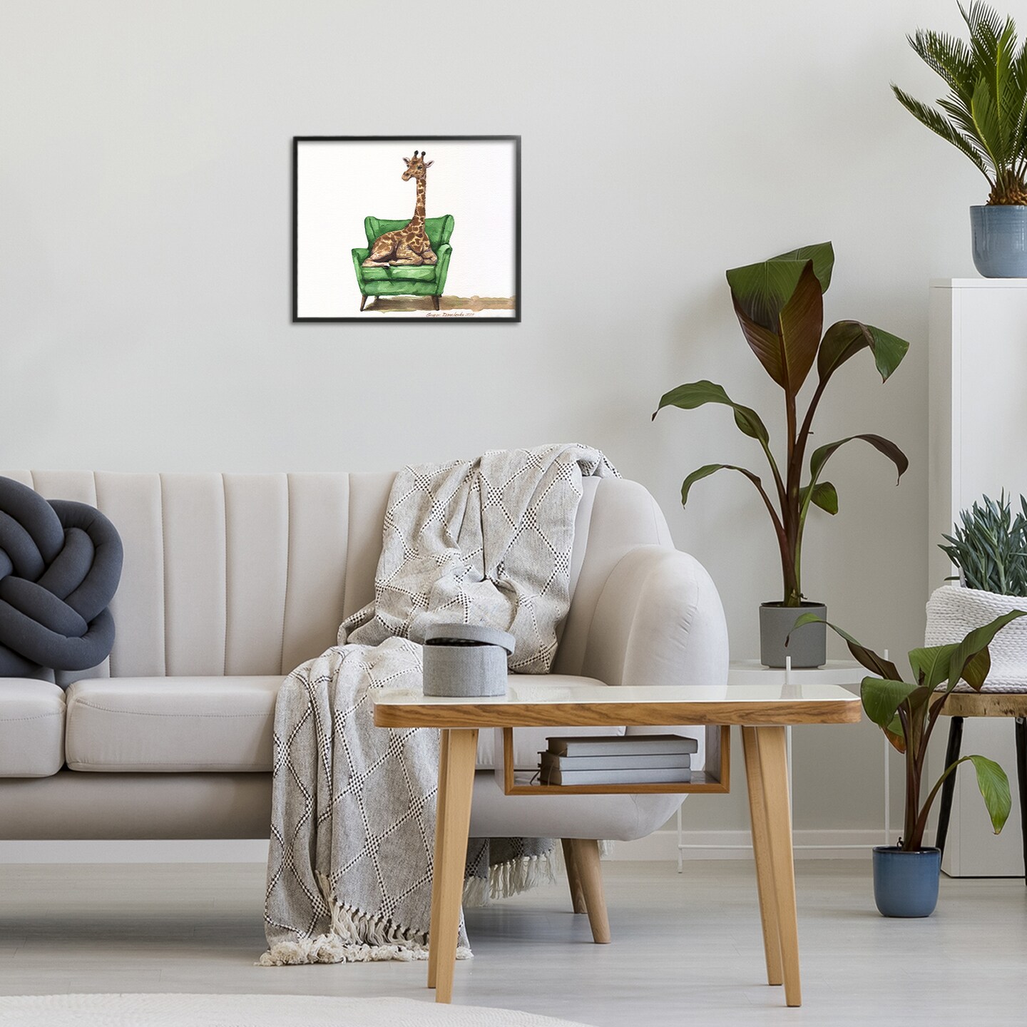 Stupell Industries Cute Giraffe on Green Chair Framed Giclee, design by George Dyachenko
