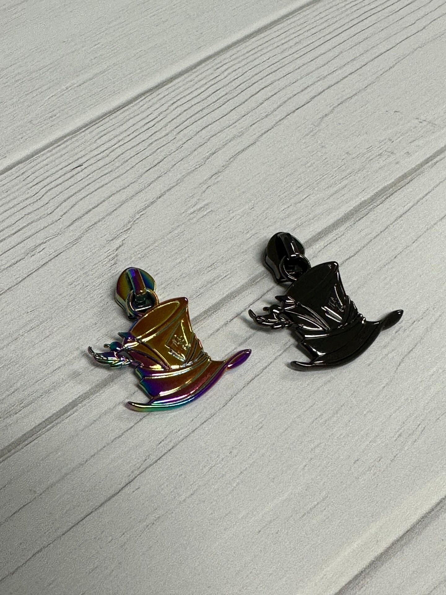 Alice Hatter zipper pulls