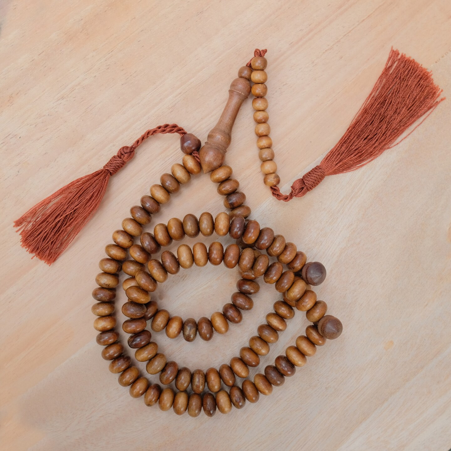 Handcrafted Ironwood 99-Bead Muslim Tasbih – Brown Nylon Tassels