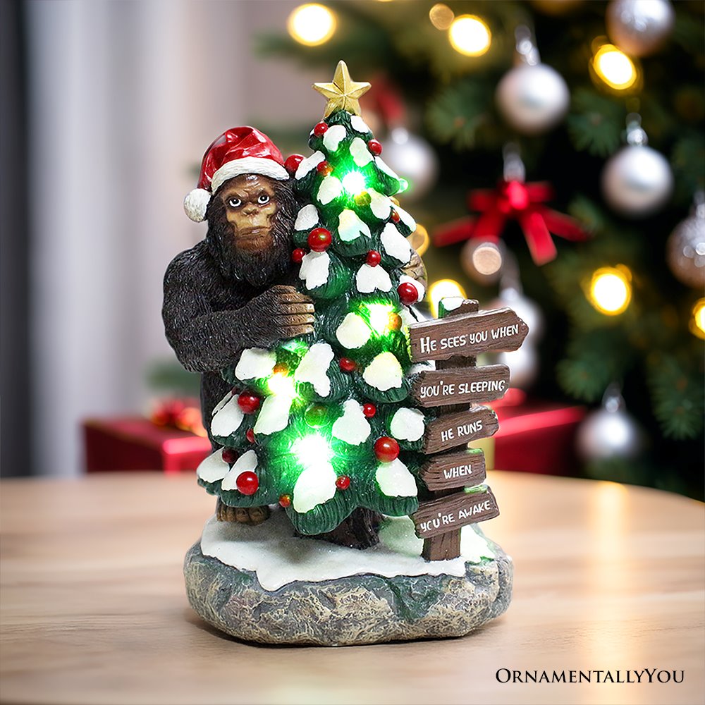 Whimsical Bigfoot Behind Christmas Tree Figurine, 7.5&#x22; Funny Holiday Yeti LED Statue, He Sees You When You&#x27;re Sleeping