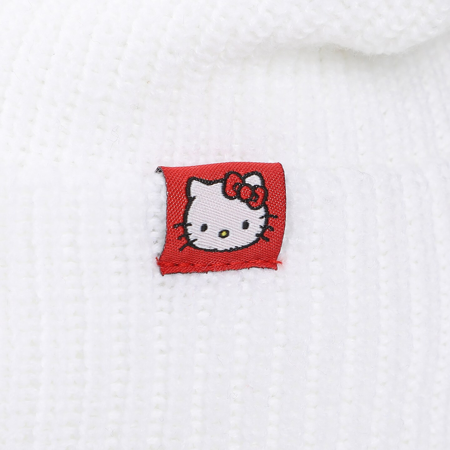 Hello Kitty Novelty Ear White Acrylic Beanie With Cut Fabric Bow With Embroidery And Red Woven Label Cuff Beanie