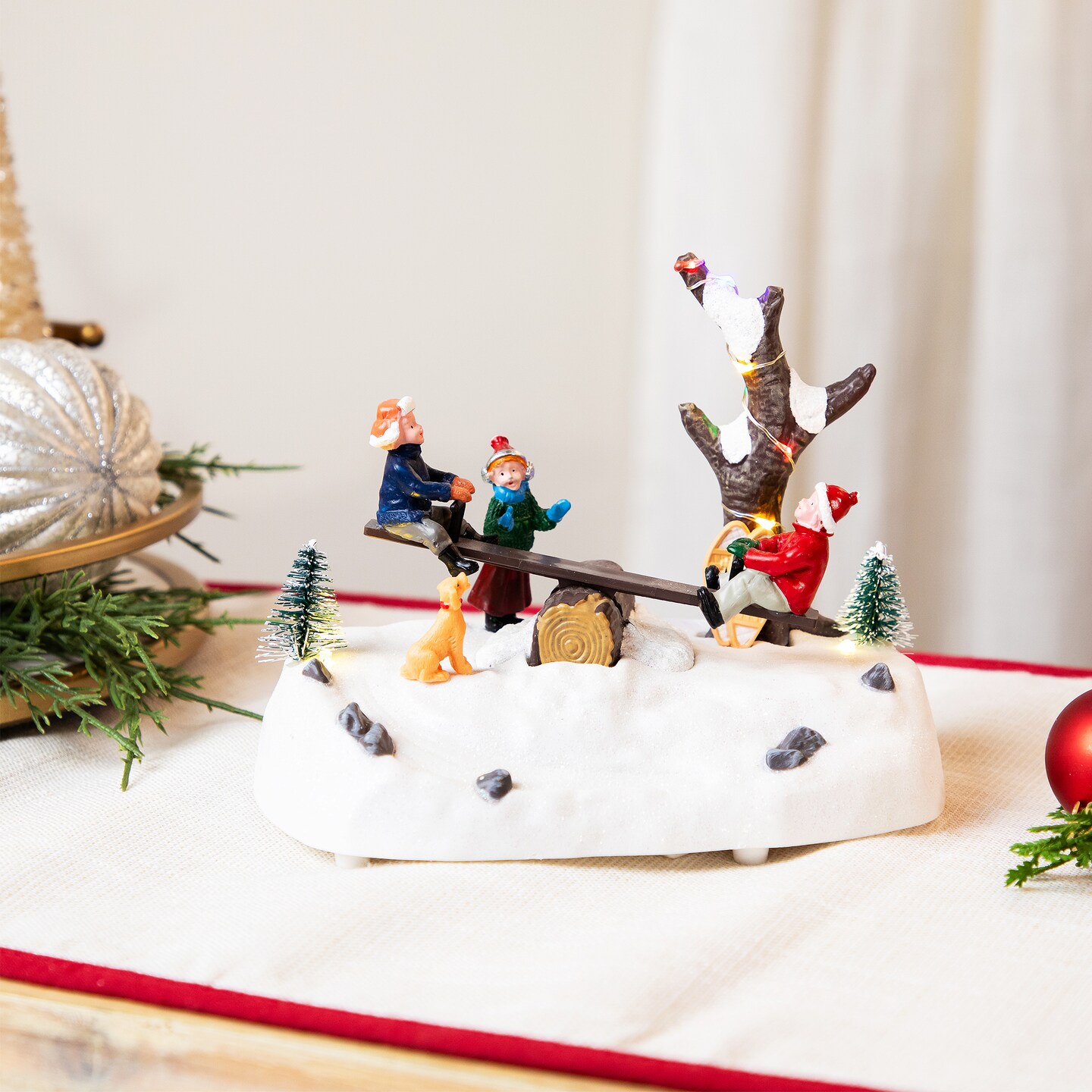 Northlight LED Lighted and Animated Winter Seesaw Scene Christmas Village Display Piece - 7.5&#x22;