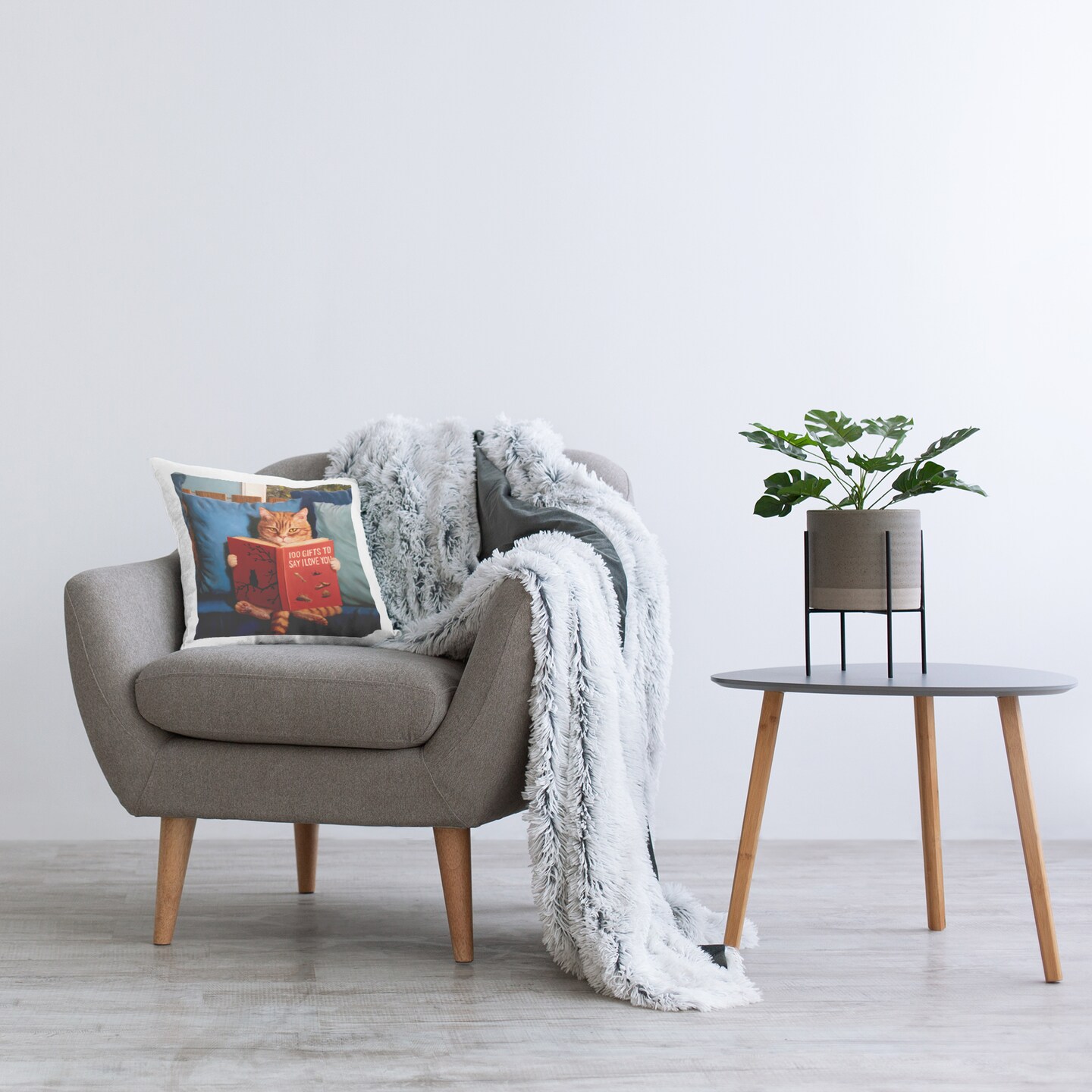 Stupell Industries Cat Reading Funny Book Decorative Printed Throw Pillow, design by Lucia Heffernan, 18 x 7 x 18