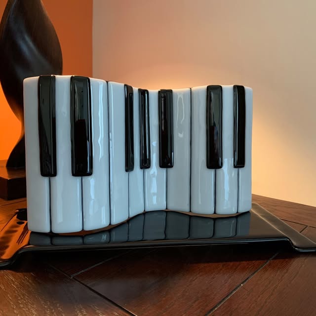 product name is Glass Piano Keyboard Sculpture with Stand