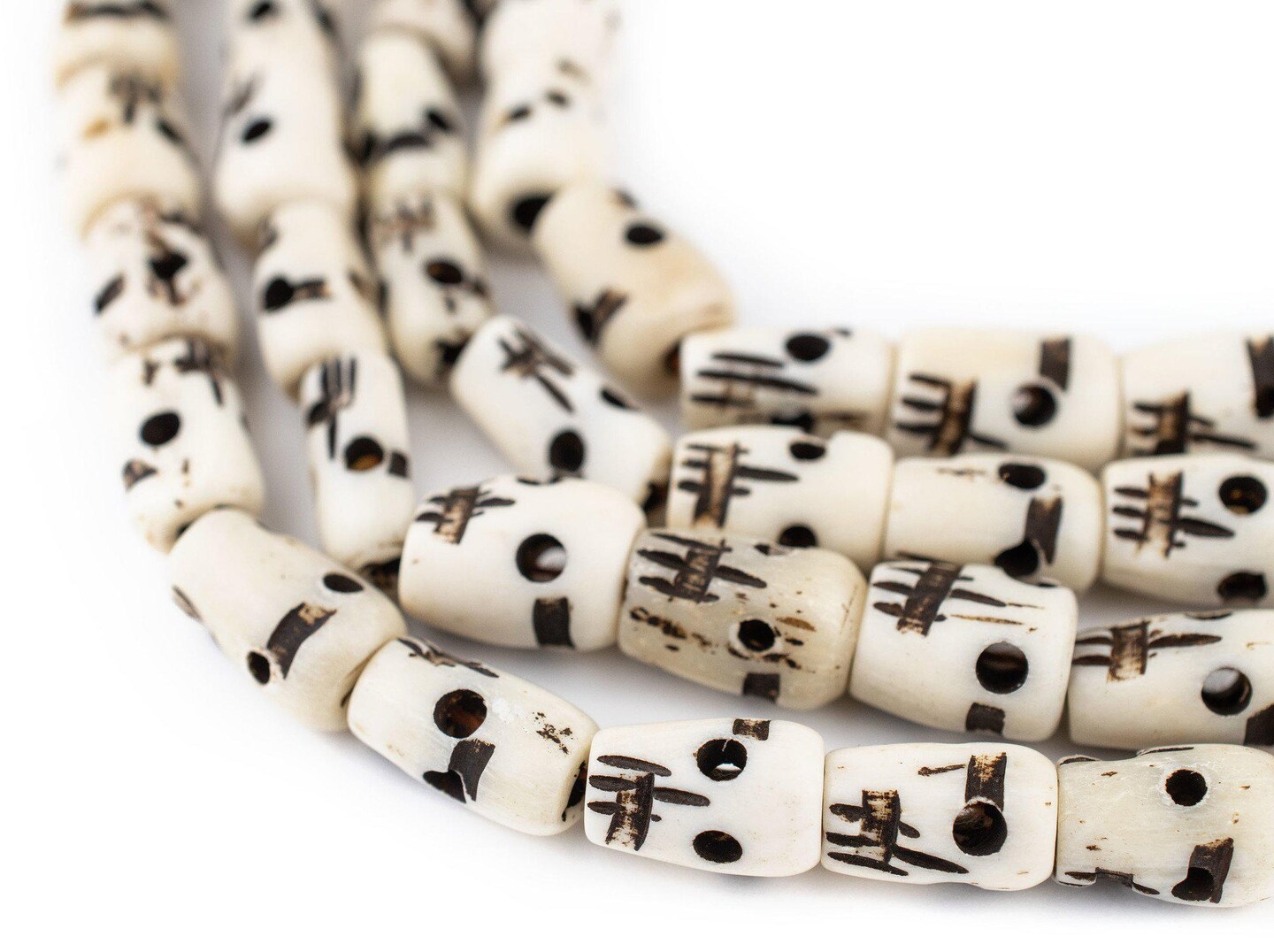 The Bead Chest Carved Bone Skull Mala Beads 12x8mmLong Strand Nepal Black and White Large Hole 54 Inch Strand