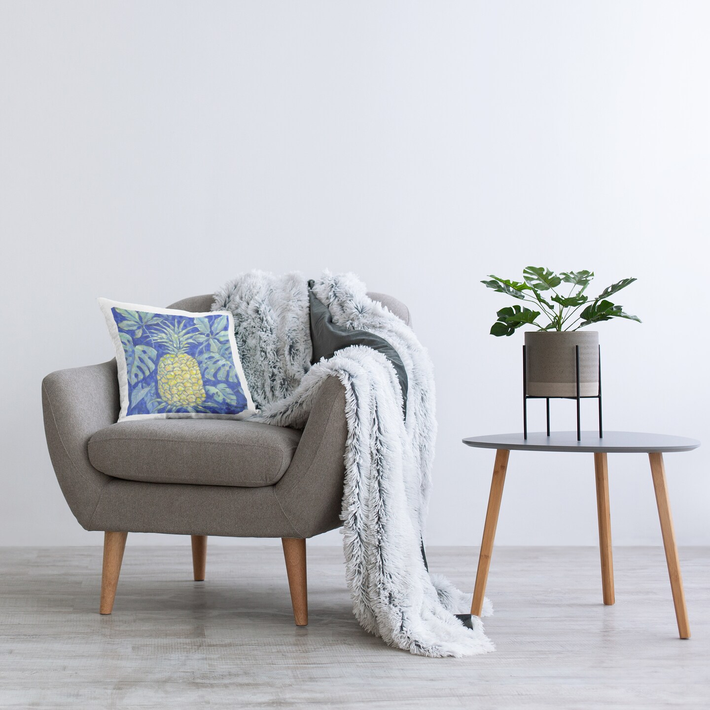 Stupell Industries Tropical Pineapple on Blue Decorative Printed Pillow design by Paul Brent, 18 x 7 x 18