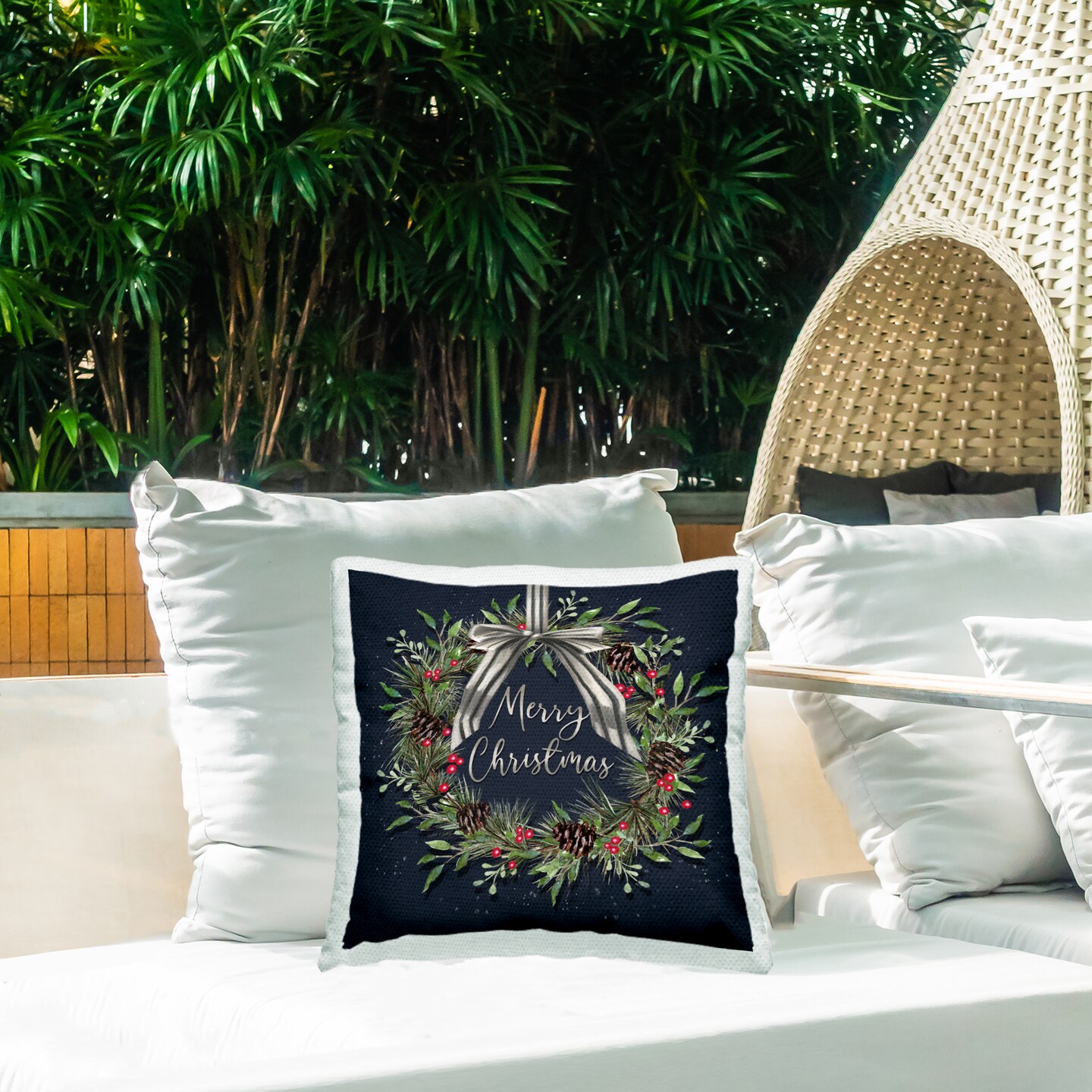 Stupell Industries Hanging Christmas Wreath with Bow Outdoor Printed Pillow design by Elizabeth Tyndall, 18 x 7 x 18