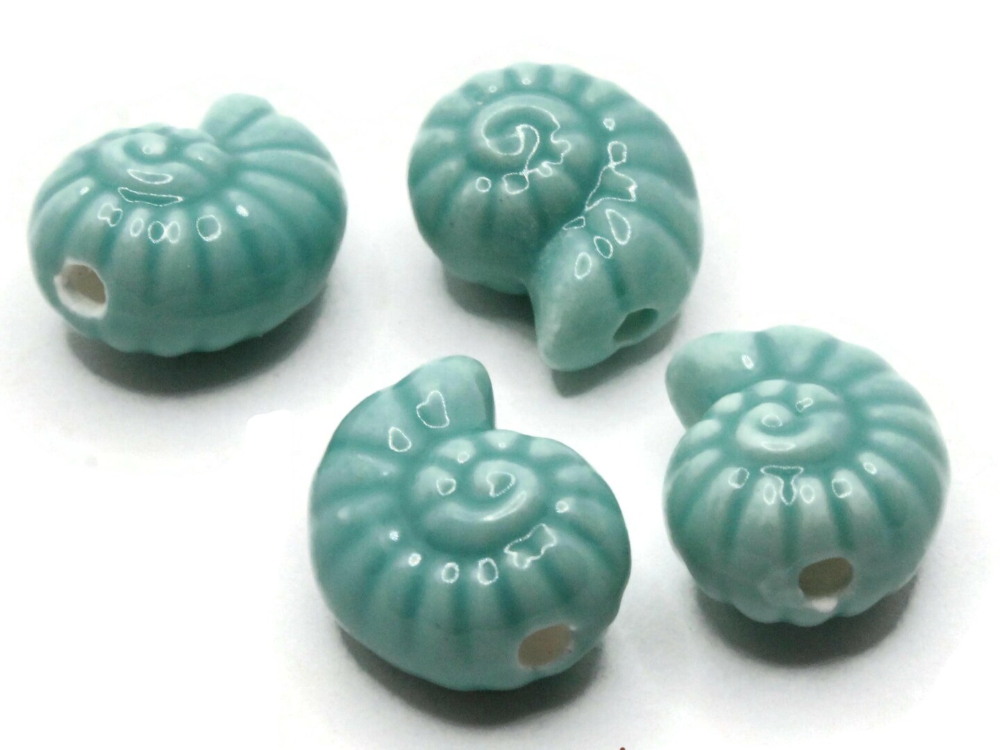 4 14mm Teal Green Porcelain Spiral Seashell Beads