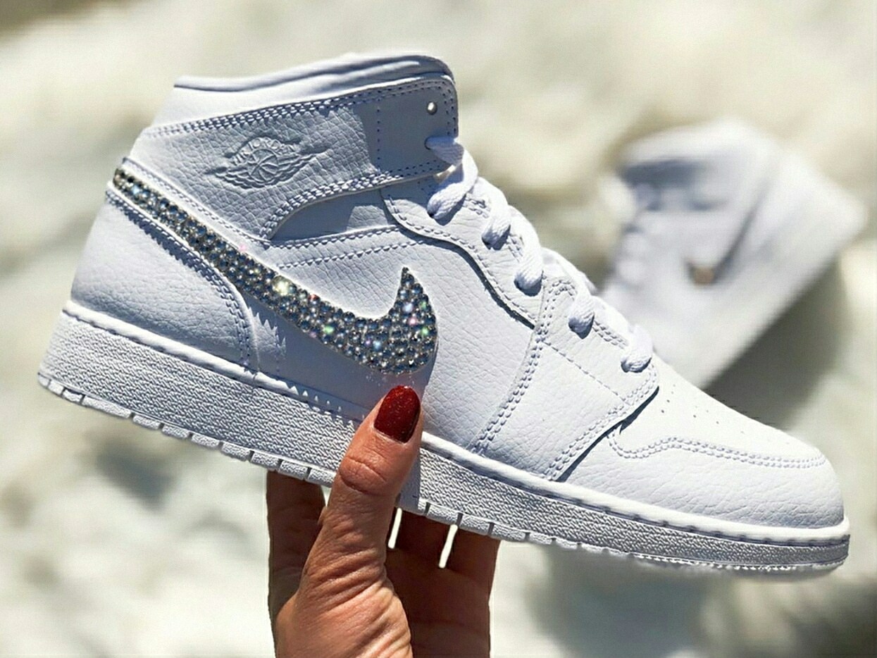 Swarovski Women s Nike Air Jordan Retro 1 Mid All White Sneakers Blinged Out With Authentic Clear Swarovski Crystals Custom Bling Nike Shoes MakerPlace by Michaels