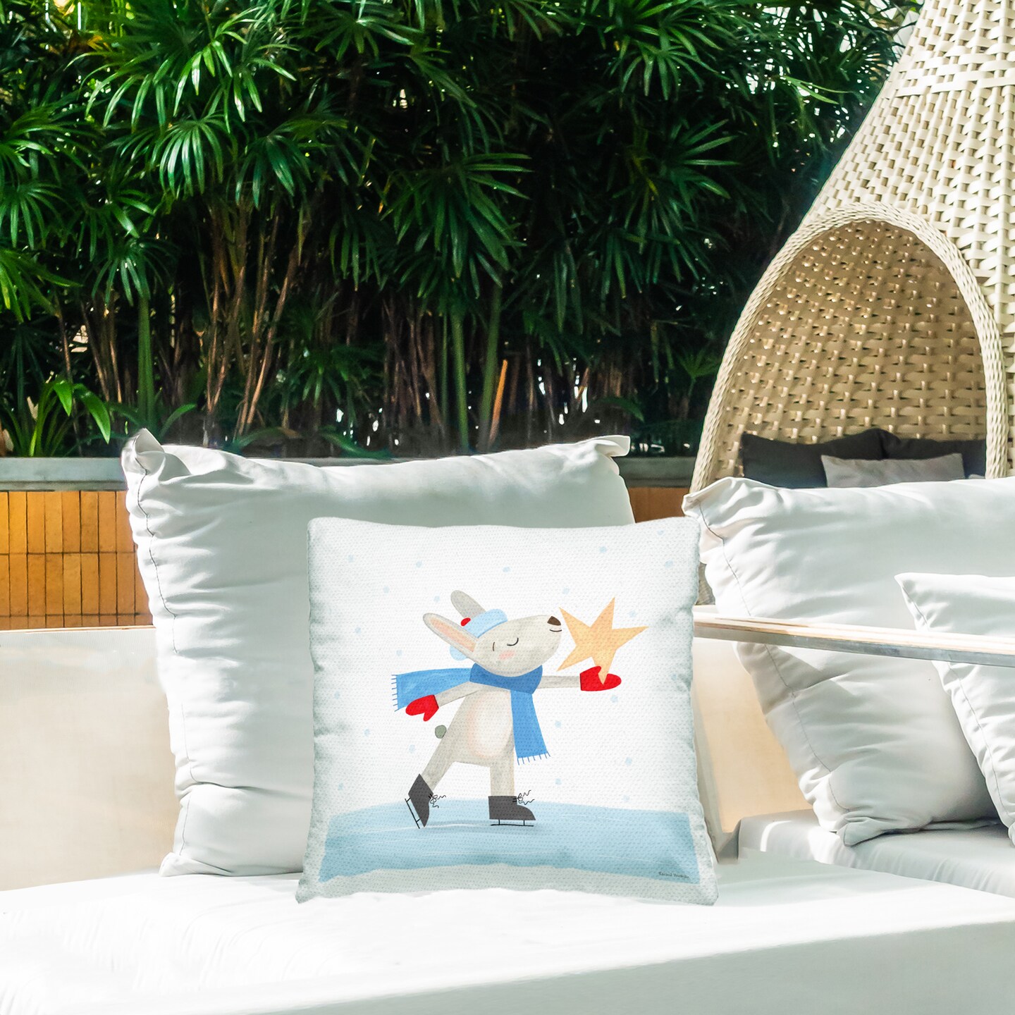 Stupell Industries Ice Skating Bunny with Star Outdoor Printed Pillow, design by Rachel Nieman, 18 x 7 x 18
