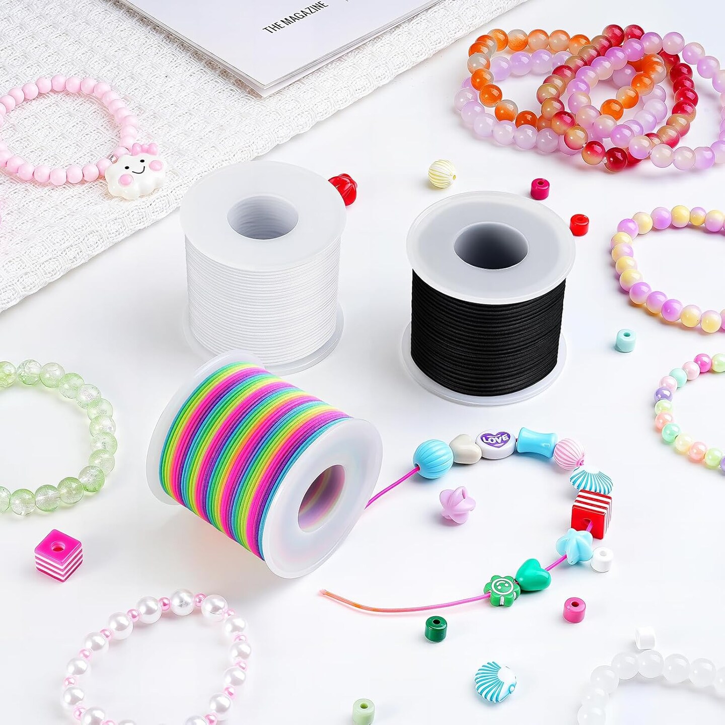 Stretchy Bracelet String Kit – 4 Rolls Elastic Cord (Black, White, Rainbow) with Scissors & Beading Needle, 1mm Elastic Jewelry String for DIY Bracelets, Necklaces, Beading, 660FT Total