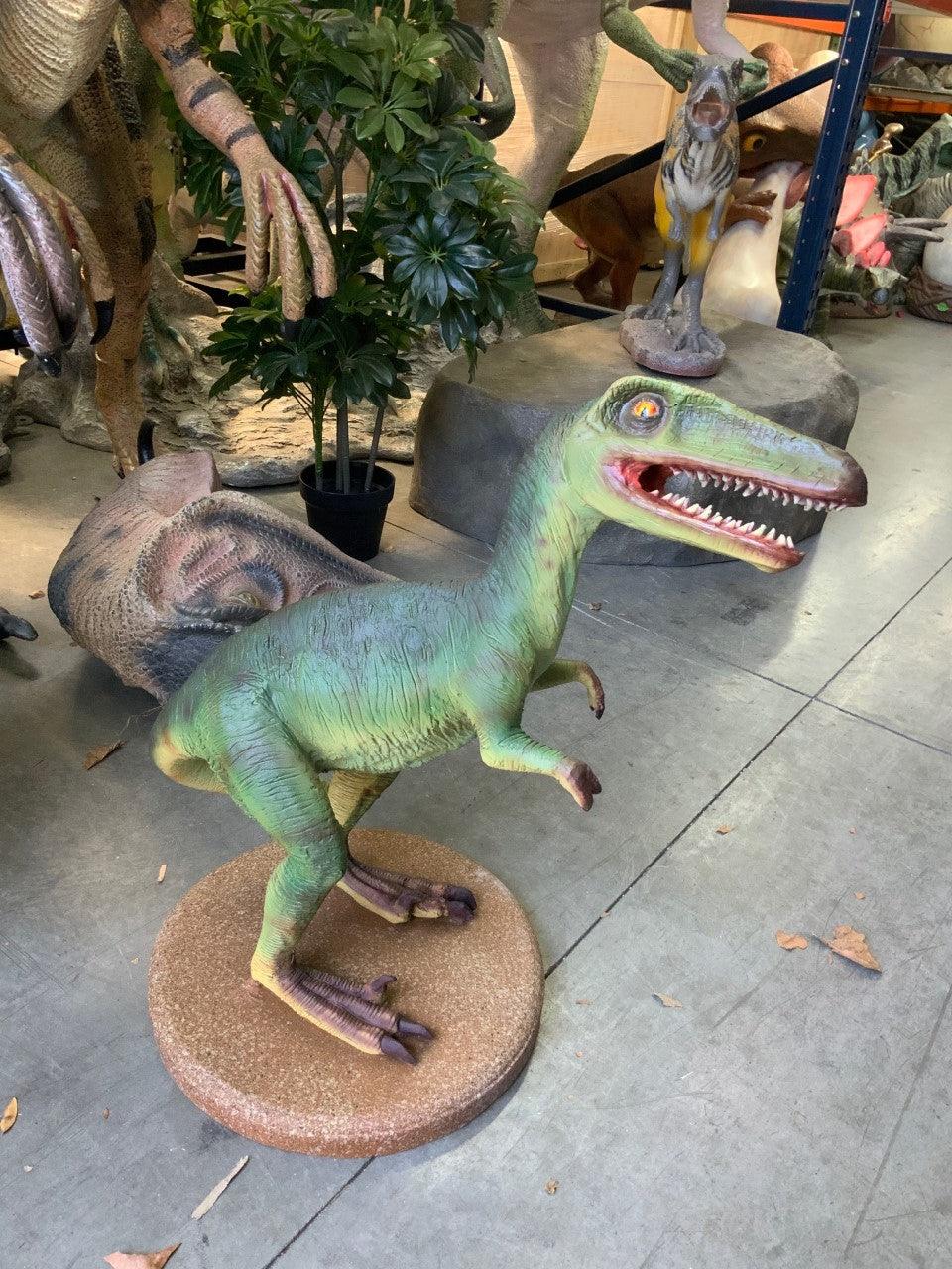 Small Green Baby Raptor Dinosaur Statue