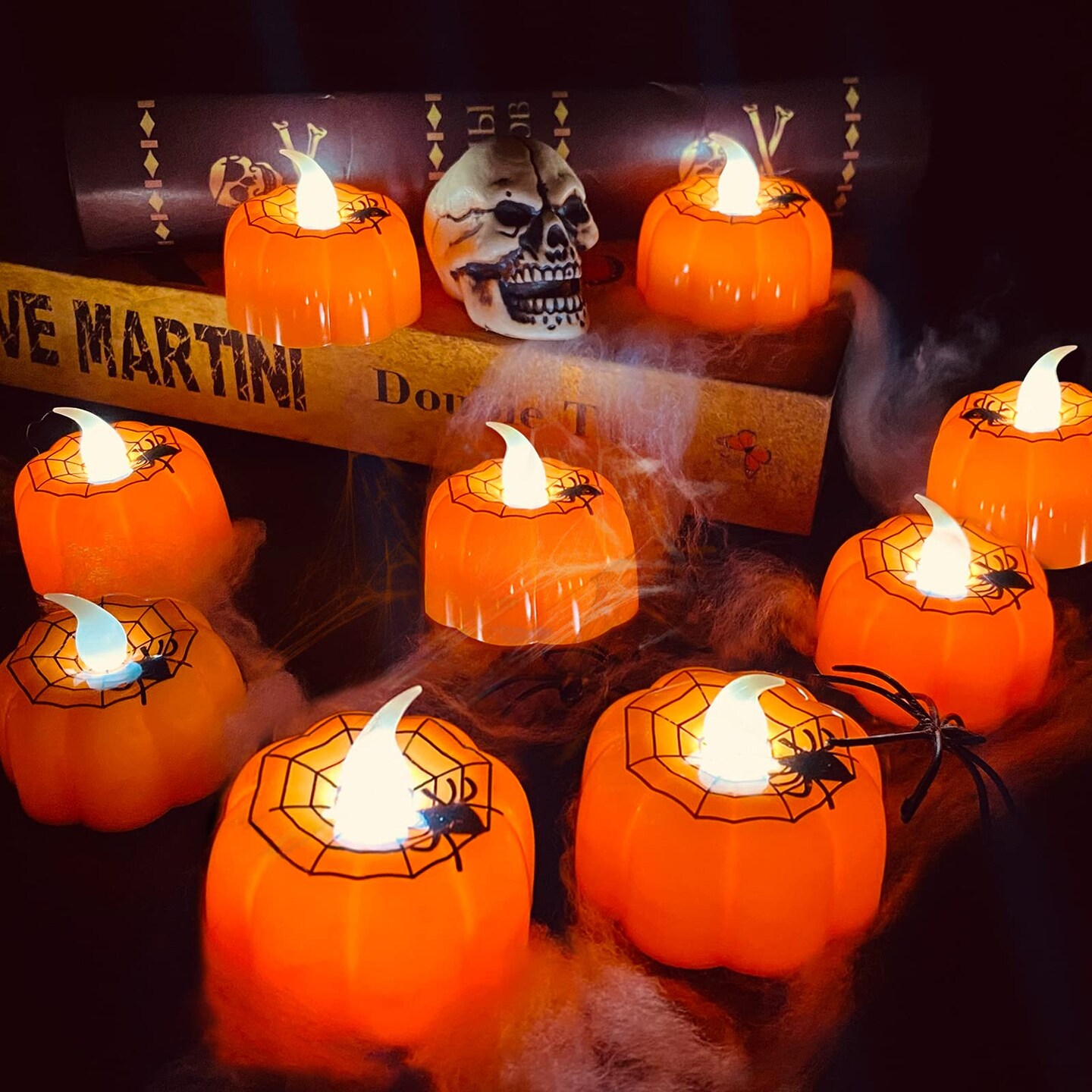 12 Pieces Halloween Pumpkin Tealights Candles with Spider Web Decor, LED Pumpkin Lights, Flame Less Candle Battery Operated Halloween Table Decorations Home Fireplace Party Thanksgiving Fall