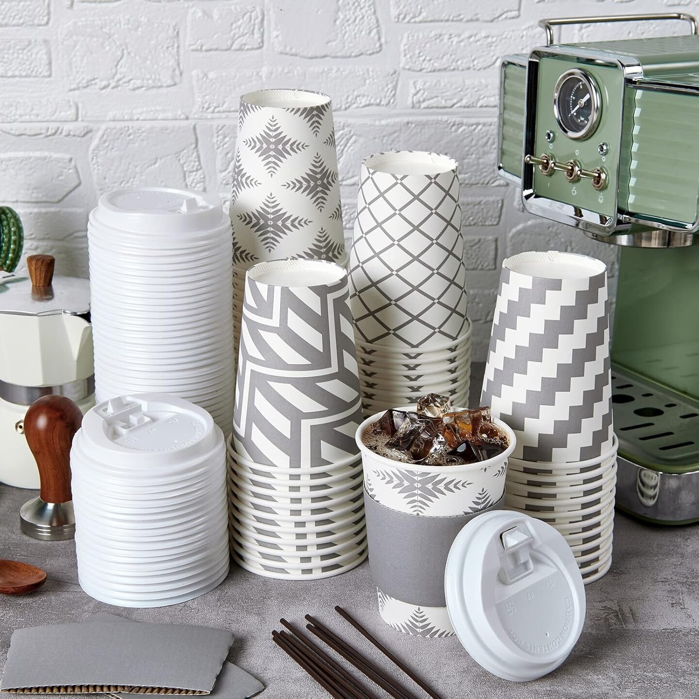 100 Pack 12 oz Paper Coffee Cups with Lid, Sleeve, and Straws, Four Designs of Disposable Hot Coffee Cups for Home, Stores, and Cafes