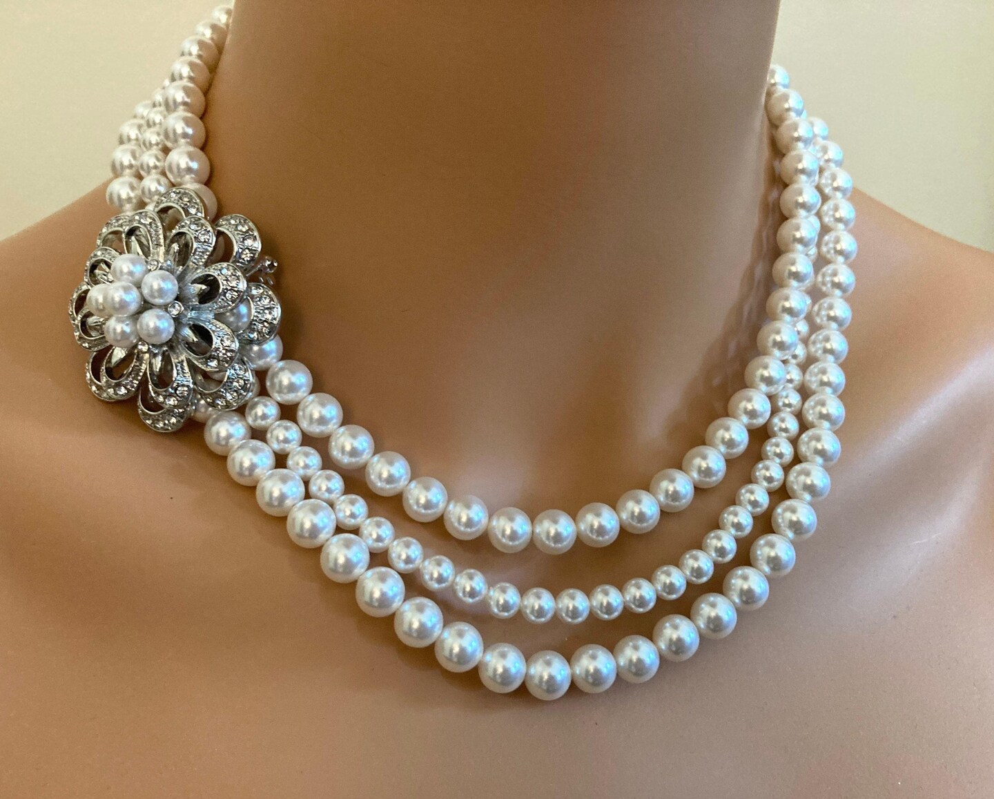 Pearl Wedding Necklace with Brooch 3 strands White Swarovski Pearls on  Silver with Pearl Stud Earrings included bridal wedding jewelry gift |  MakerPlace by Michaels, image size:1080x868