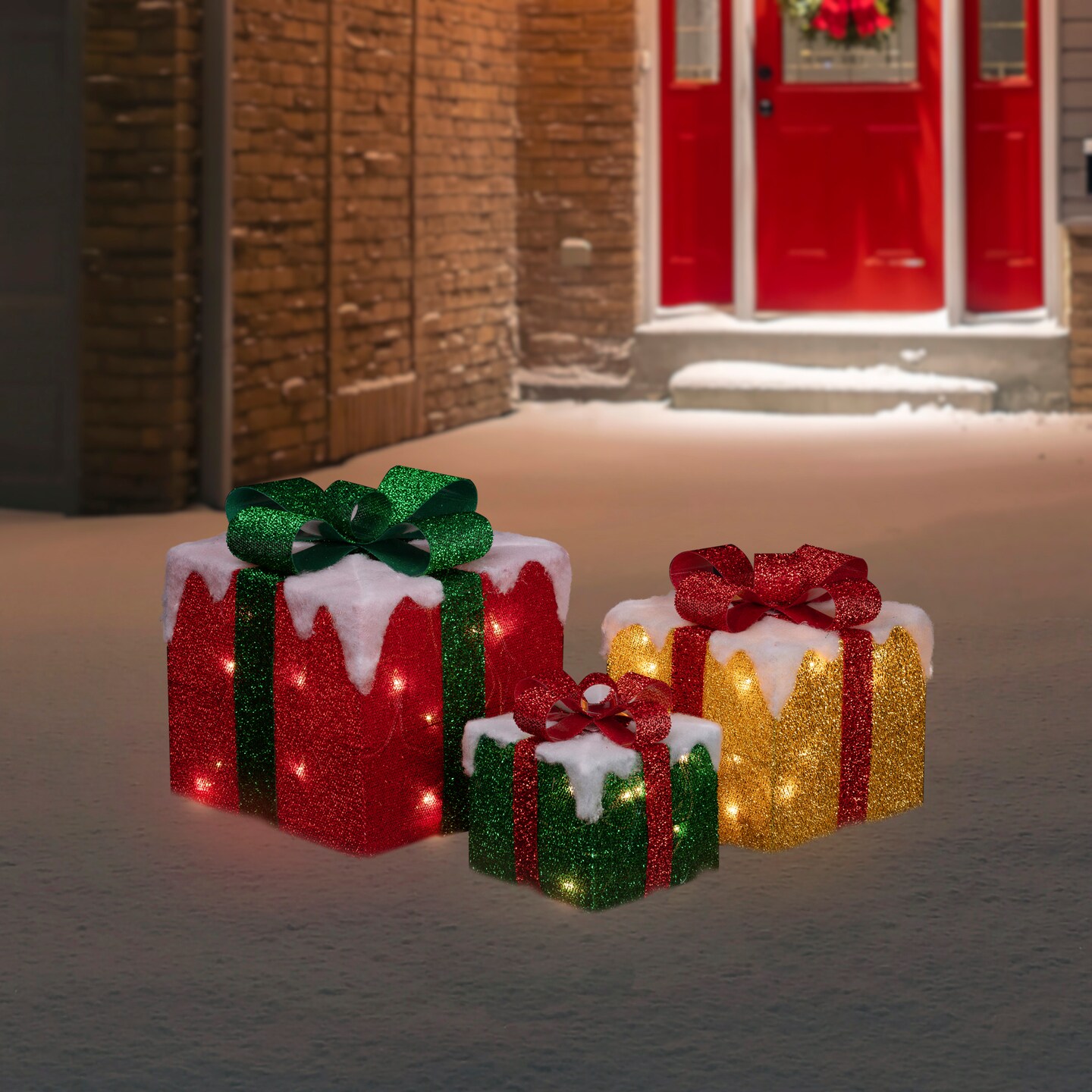 Northlight Set of 3 LED Lighted Green, Gold and Red Snowy Gift Boxes Outdoor Christmas Decorations