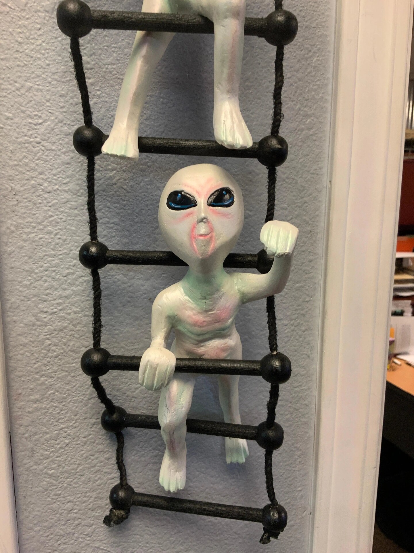 Aliens on Rope Ladder Statue
