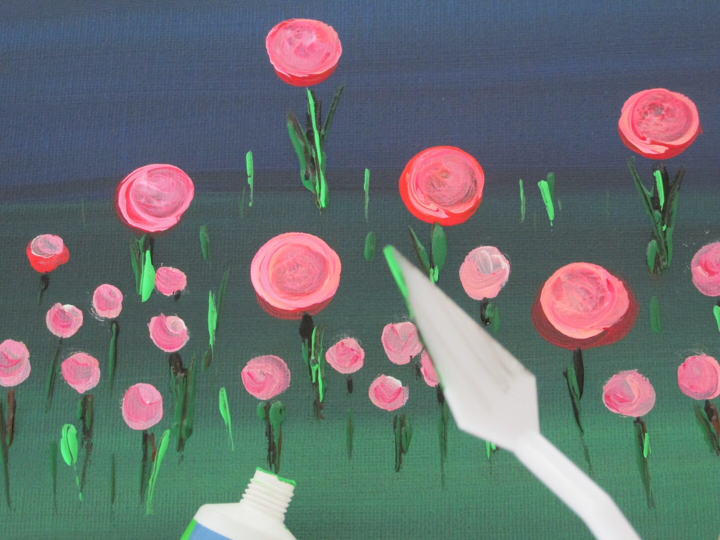 Paint flowers in grass with acrylic paint. image 7