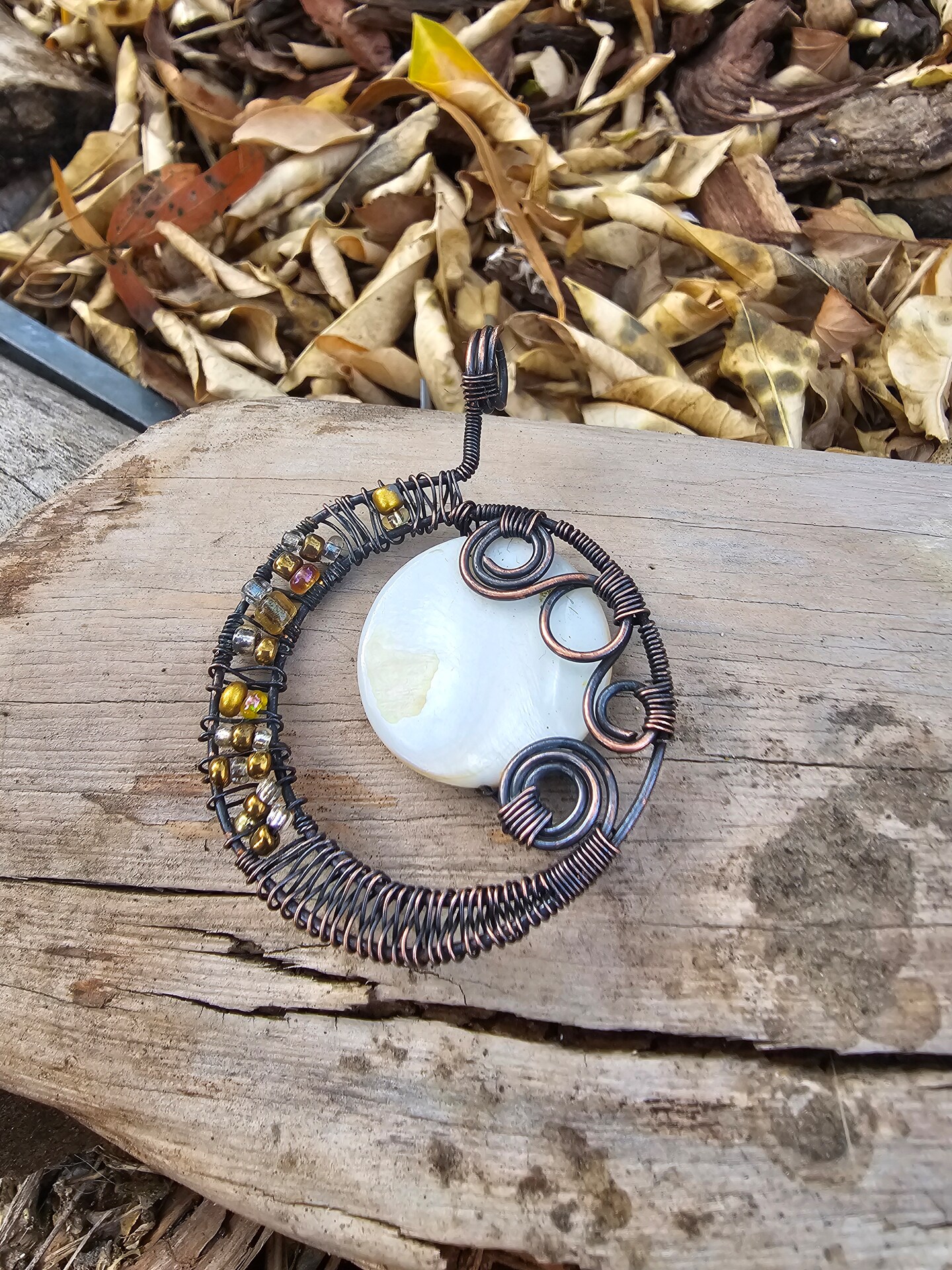 Copper wire wrapped beaded crescent moon swirl pendant