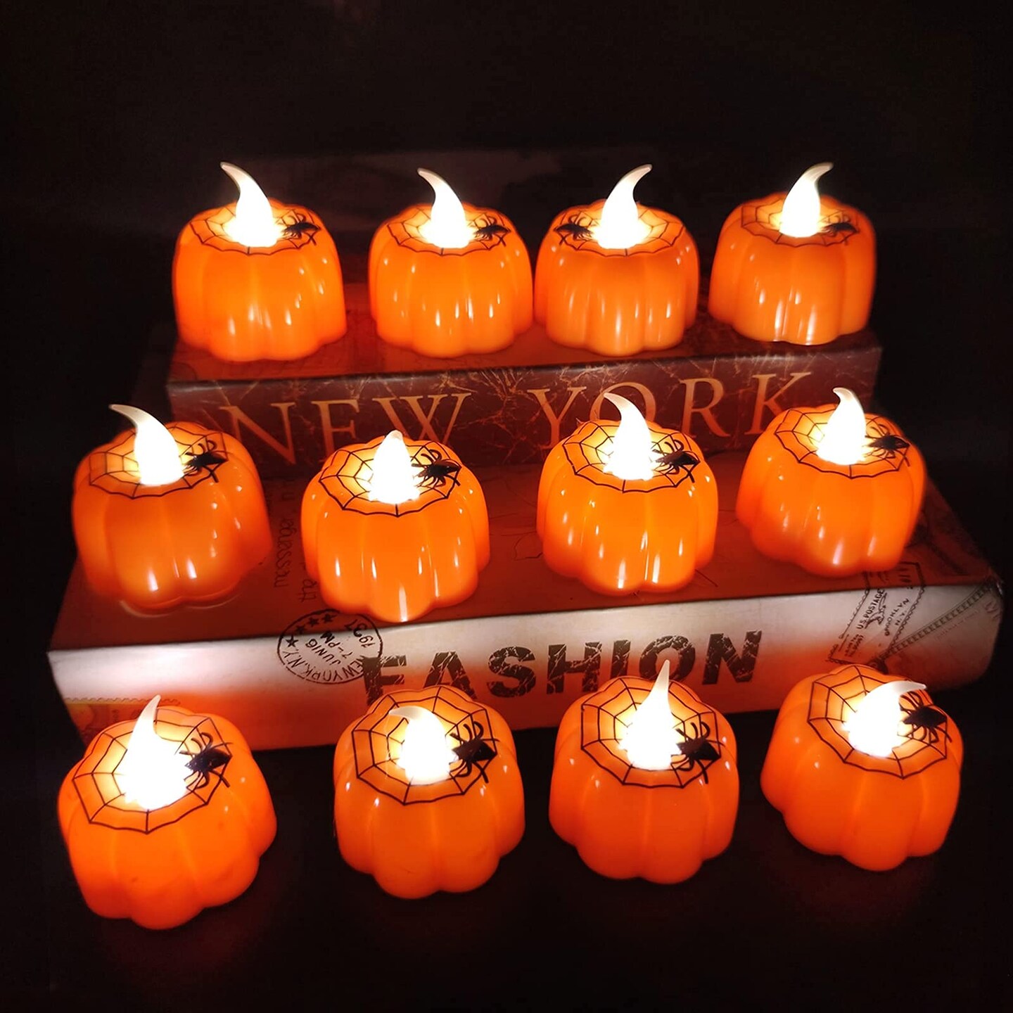 12 Pieces Halloween Pumpkin Tealights Candles with Spider Web Decor, LED Pumpkin Lights, Flame Less Candle Battery Operated Halloween Table Decorations Home Fireplace Party Thanksgiving Fall
