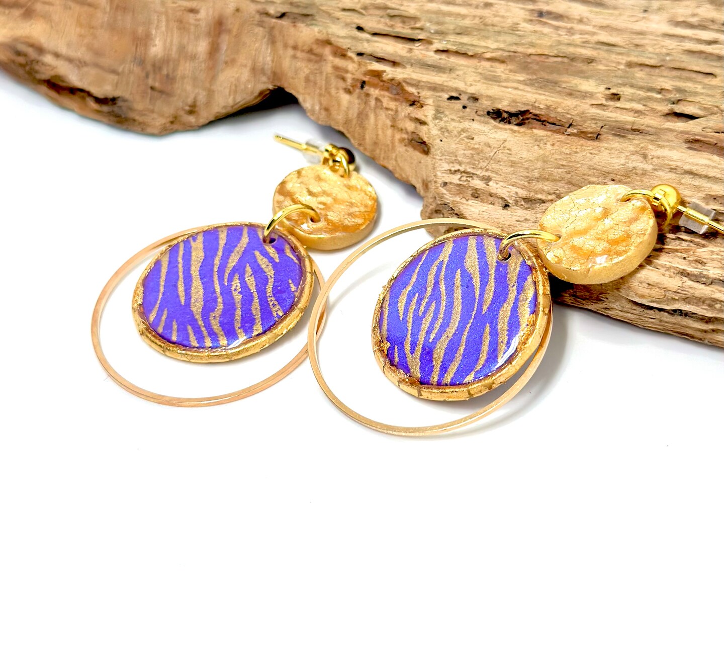 Purple and gold tiger print dangle hoop earrings with hammered