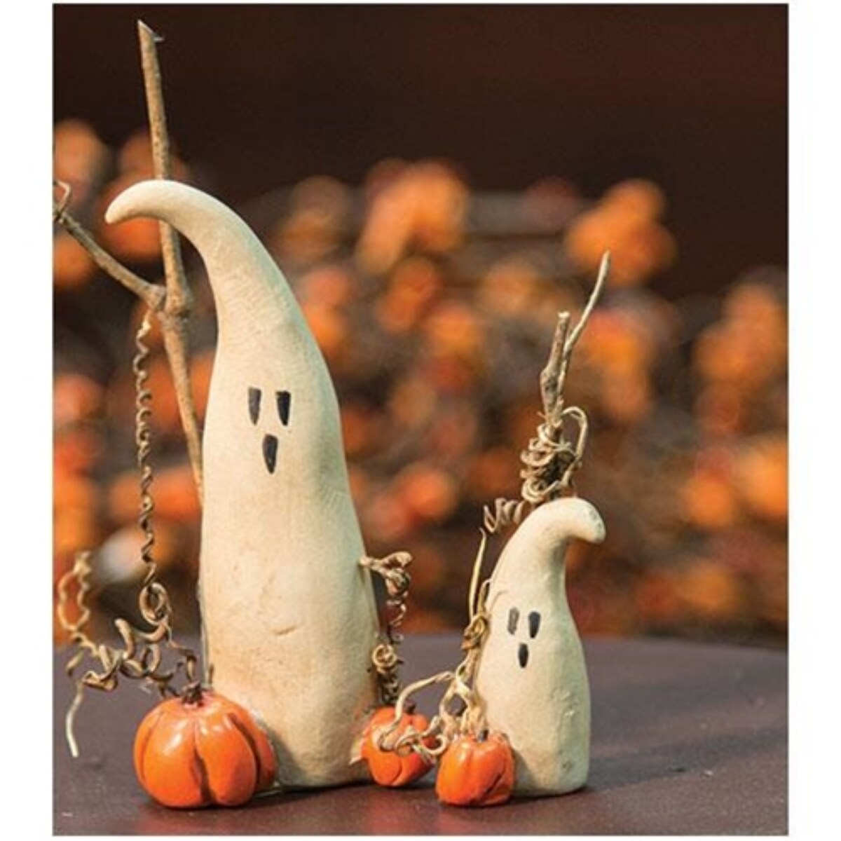 Friendly Resin Ghost Figurine with Pumpkin and Twig Accents
