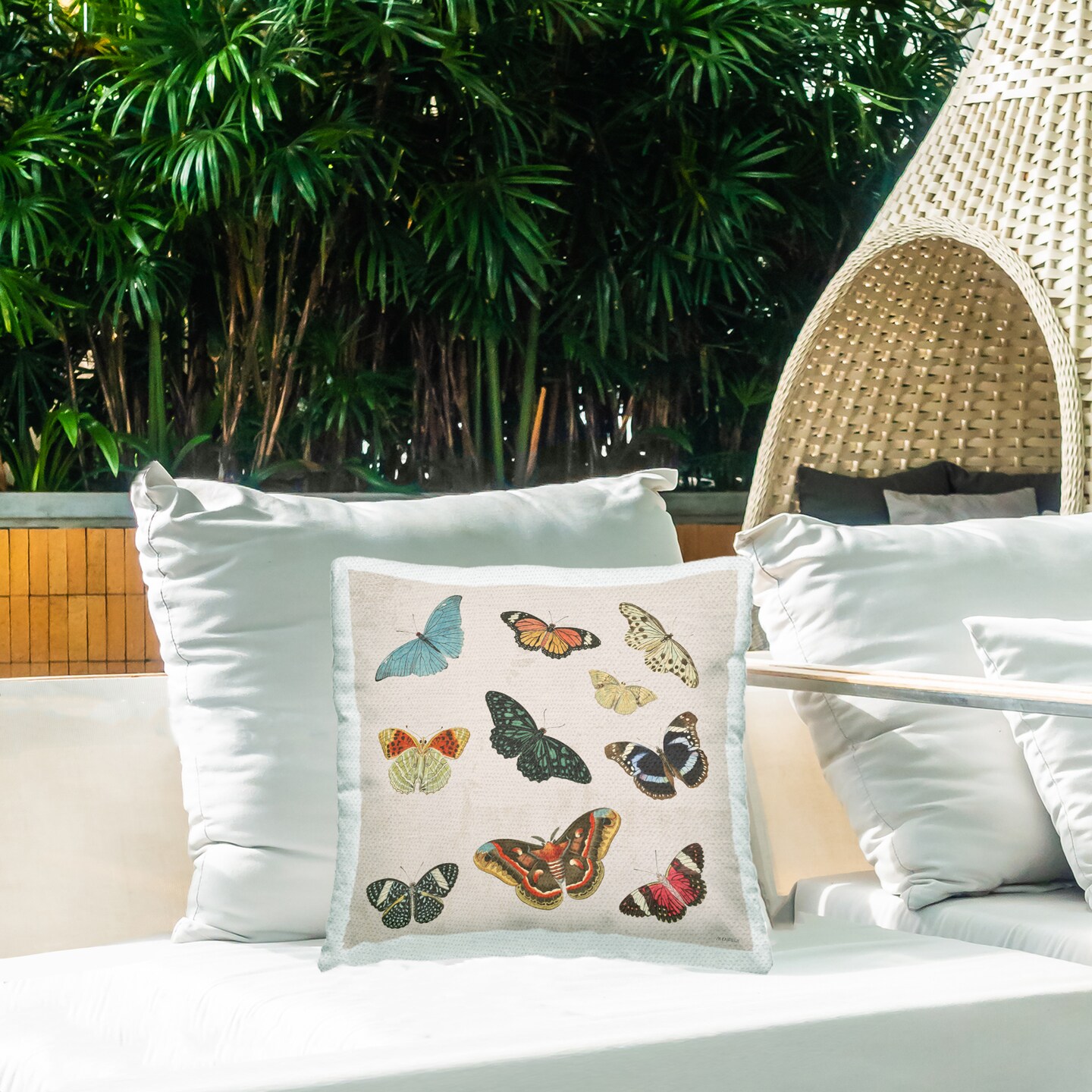 Stupell Industries Assorted Butterflies on Neutral Outdoor Printed Pillow, design by Dan Meneely, 18 x 7 x 18