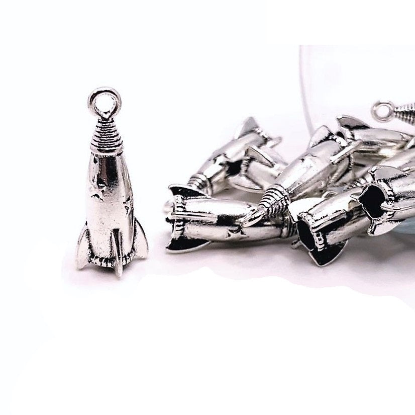 Silver Rocket Ship Charms, 24x9.5mm | Michaels