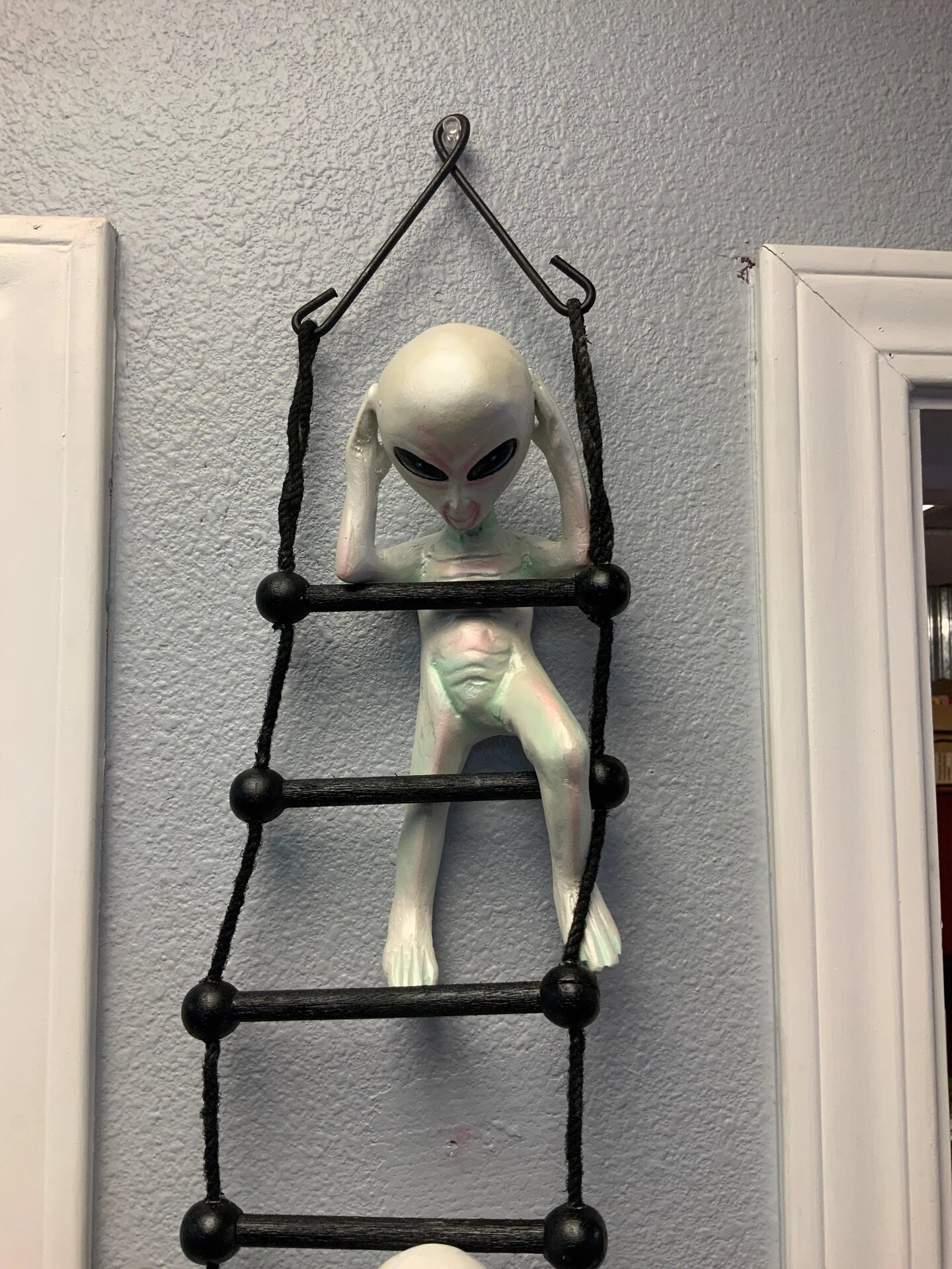 Aliens on Rope Ladder Statue