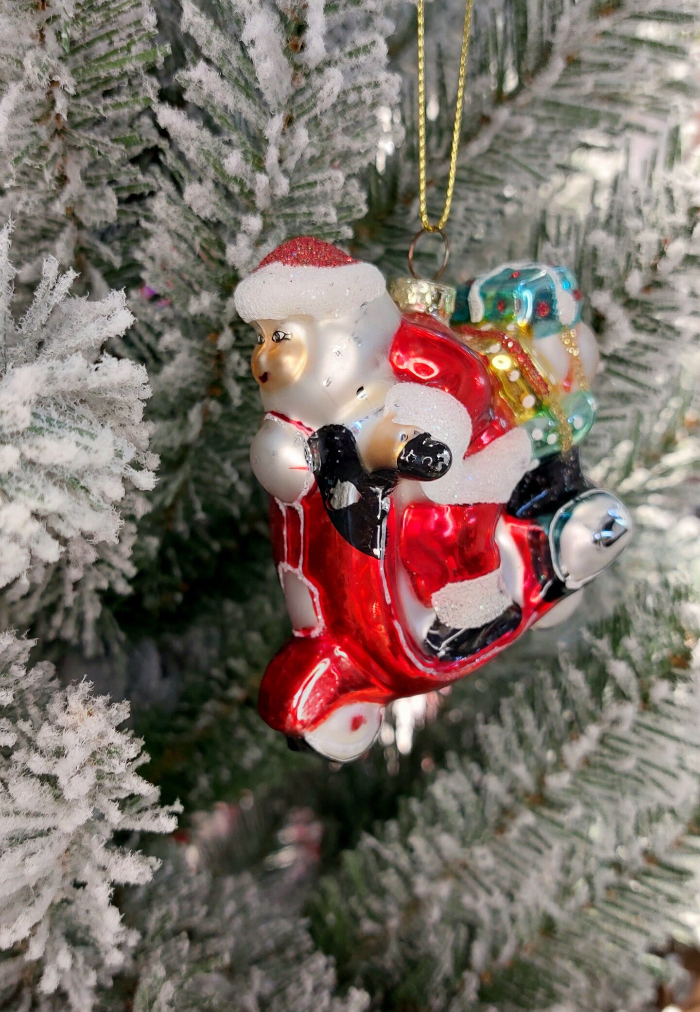 Christmas Glass Ornament - Santa Riding Motorcycle by Wizardi