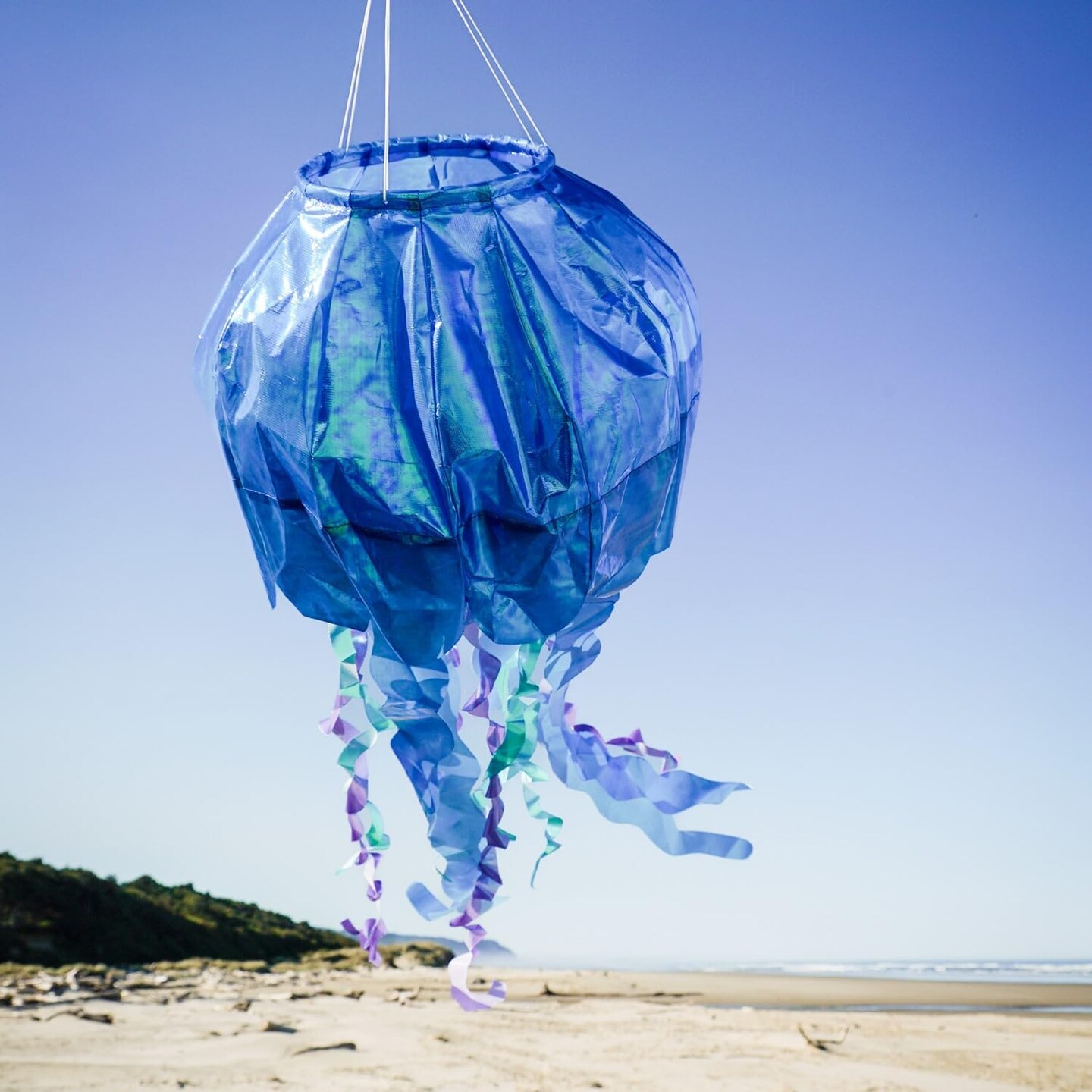 In the Breeze 5259 &#x2014; 50-inch Blue Iridescent Jellyfish 3D Windsock &#x2014; Simmering Windsock with Inflatable Head and Free-Flowing Tentacles