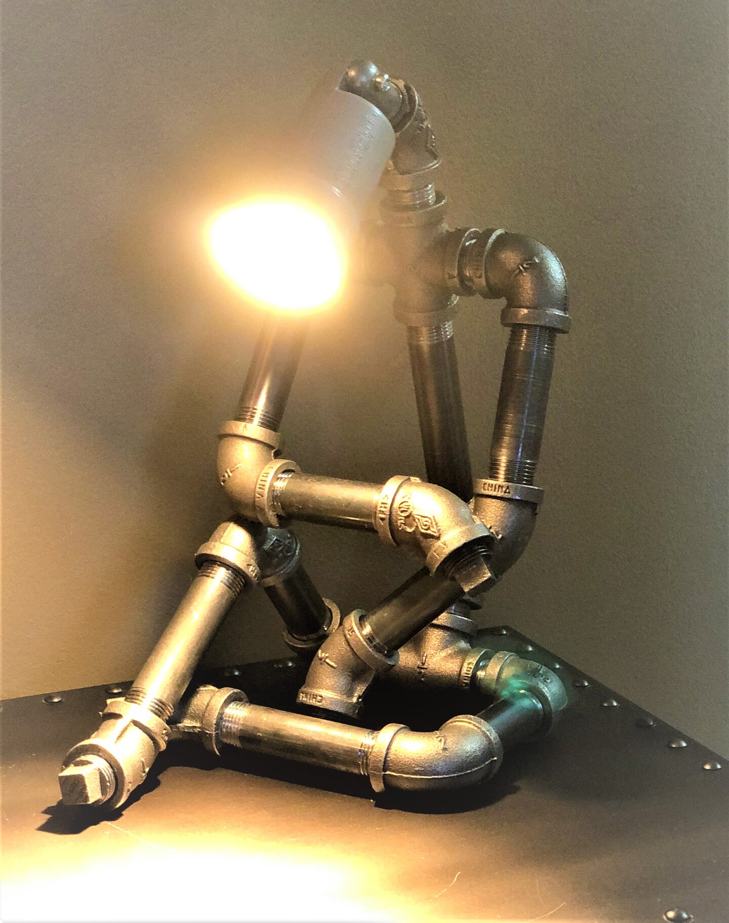 Industrial Pipe Thinking Man Lamp Tobias MakerPlace by Michaels