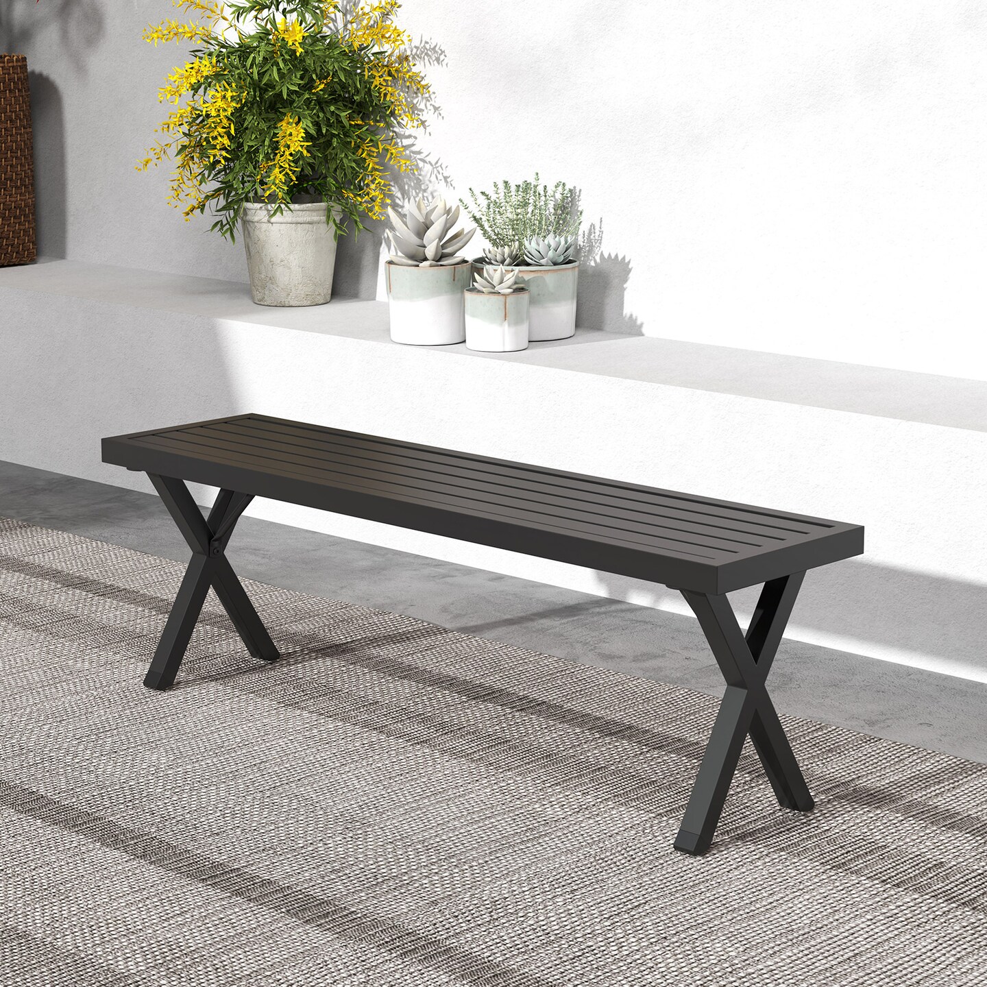 Black Metal Patio Bench with Slatted Design Seat and X-Shaped Legs Ideal for Outdoor Seating