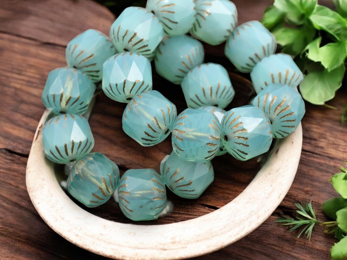 *10* 10mm Bronze Washed Aqua Blue (Vaseline Glass) Center Cut Cruller Beads