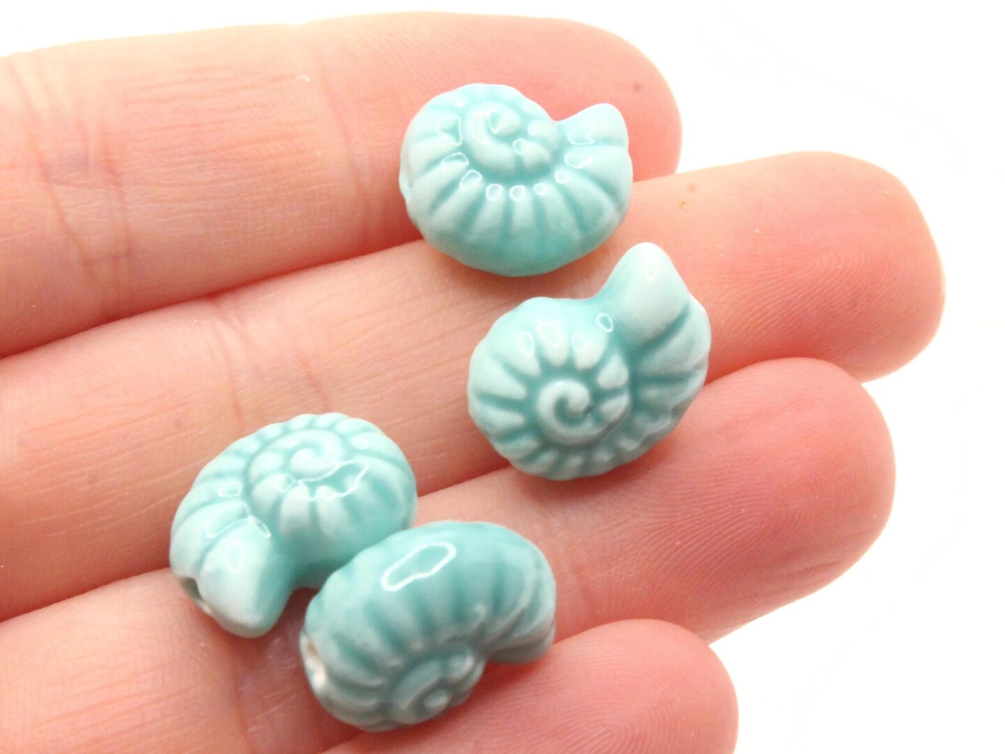 4 14mm Teal Green Porcelain Spiral Seashell Beads