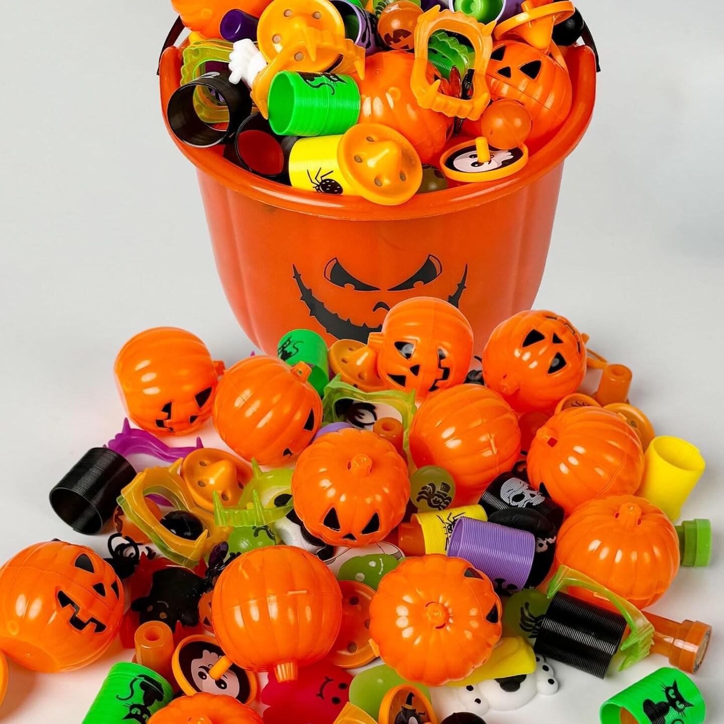 96PCS Halloween Toys in Bulk Halloween Prefilled Plastic Pumpkins Buckets (96-pcs Halloween Gift Pack)