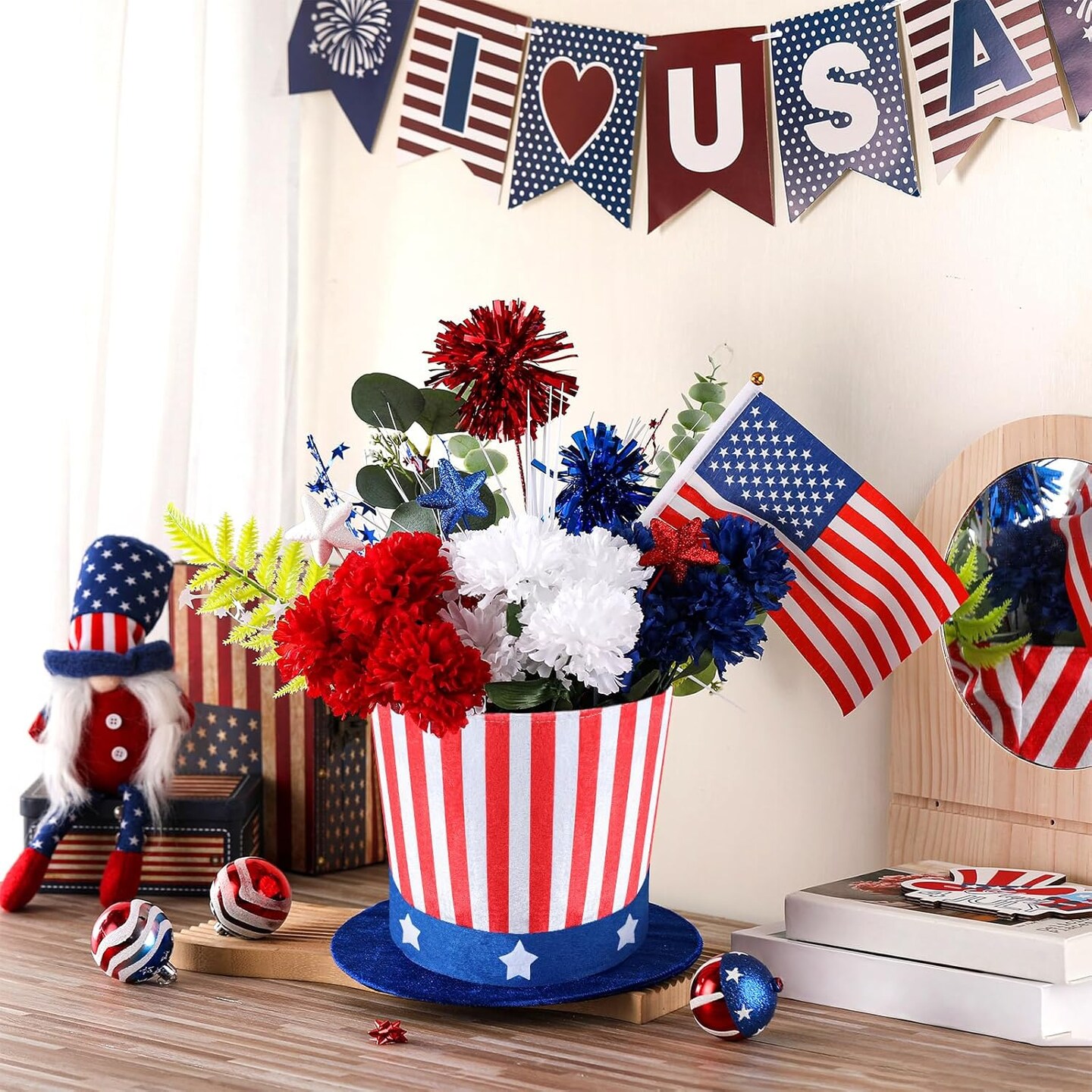 Patriotic Labor Day centerpiece with red, white, blue flowers in USA hat vases.