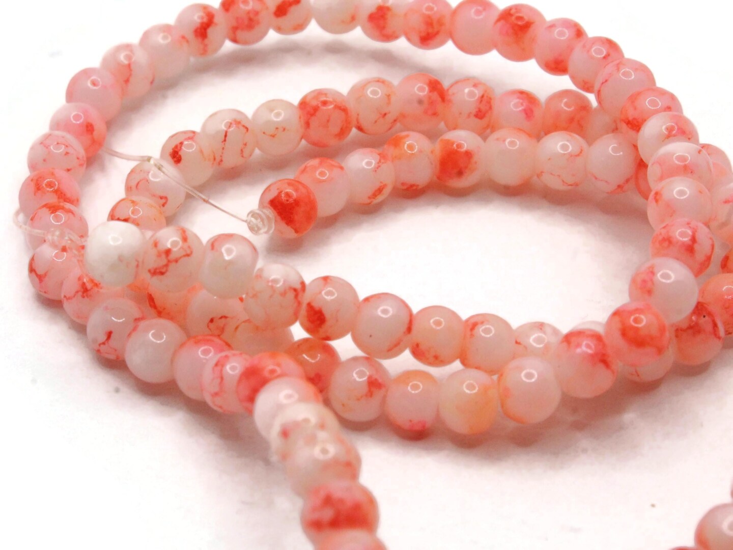 100 4mm White with Orange Splatter Paint Smooth Round Glass Beads