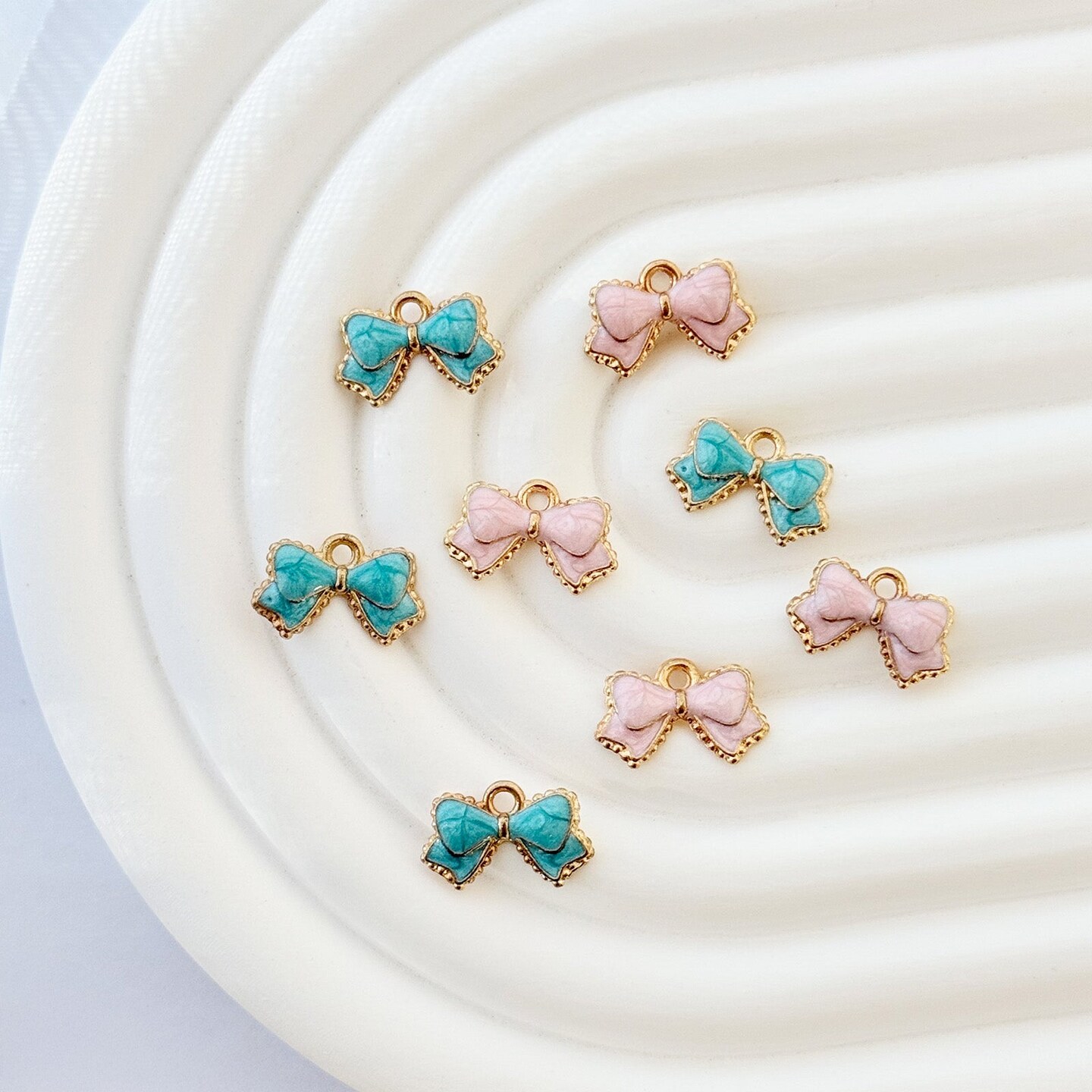 Wrapables Nature Charms for Jewelry Making Enamel Pendants, (Set of 20), Pink Bow