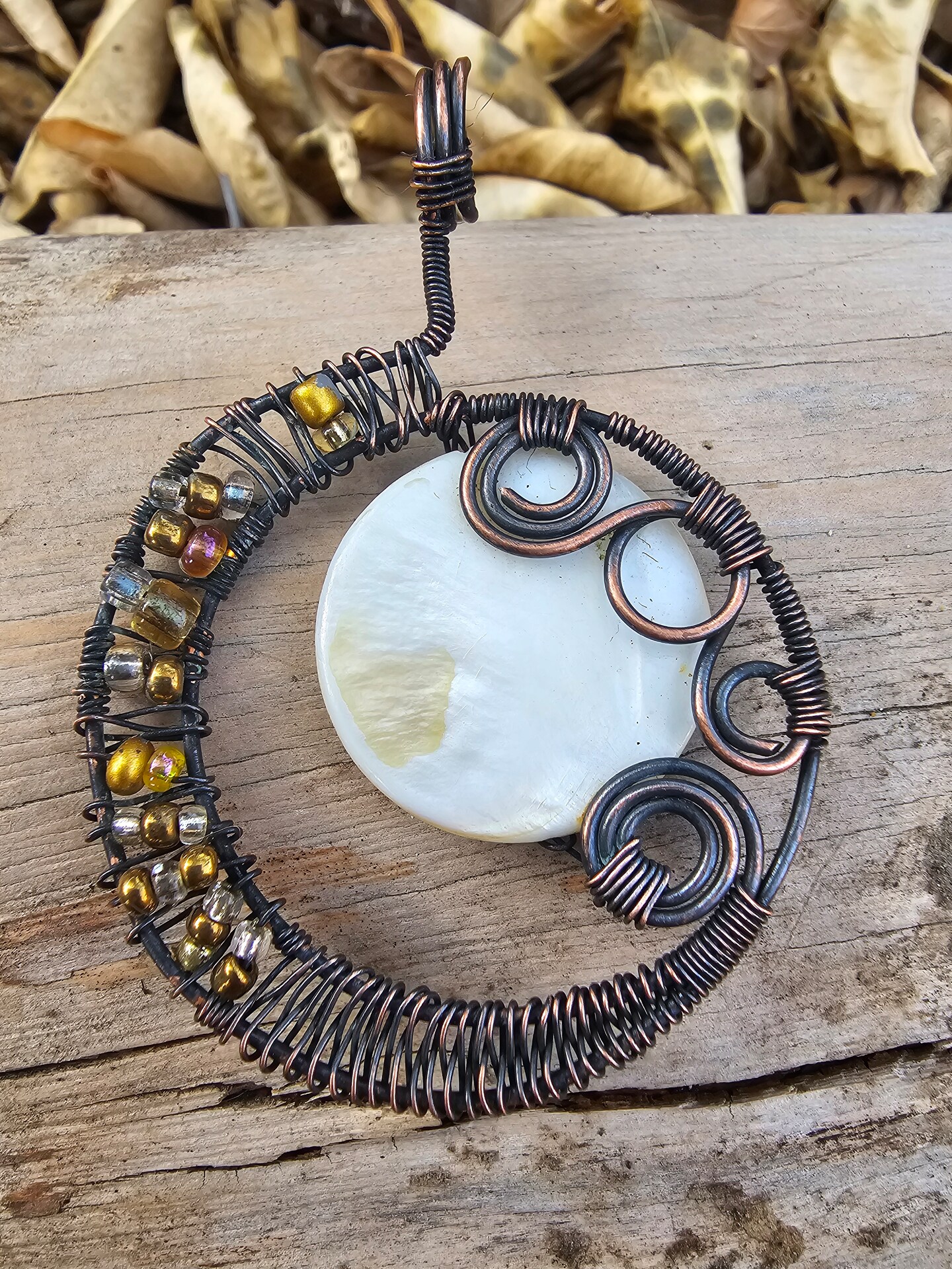 Copper wire wrapped beaded crescent moon swirl pendant