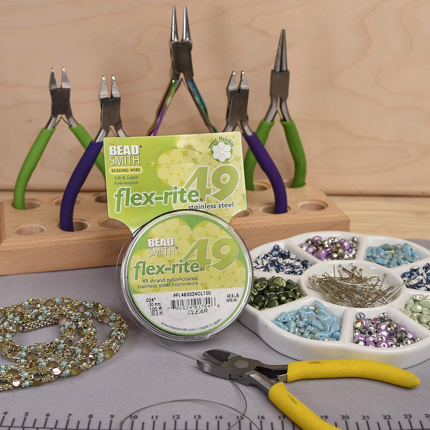The Beadsmith Flex-Rite Beading Wire - Stainless Steel Micro Flexible Wire, 49 Strand, Clear Color, .024&#x22; Diameter, 100-Foot Spool, Nylon Coated