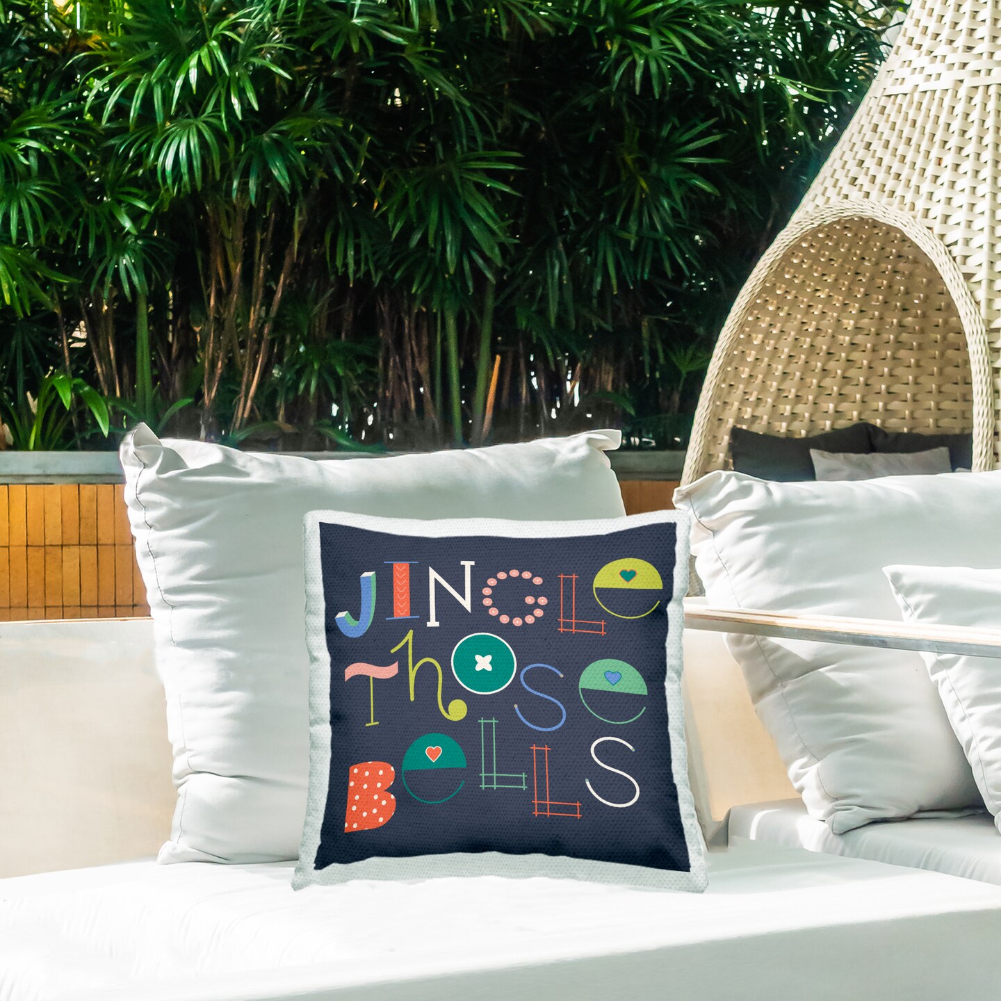 Stupell Industries Eclectic Jingle Bells Phrase Outdoor Printed Pillow design by Sazerelli Designs, 18 x 7 x 18
