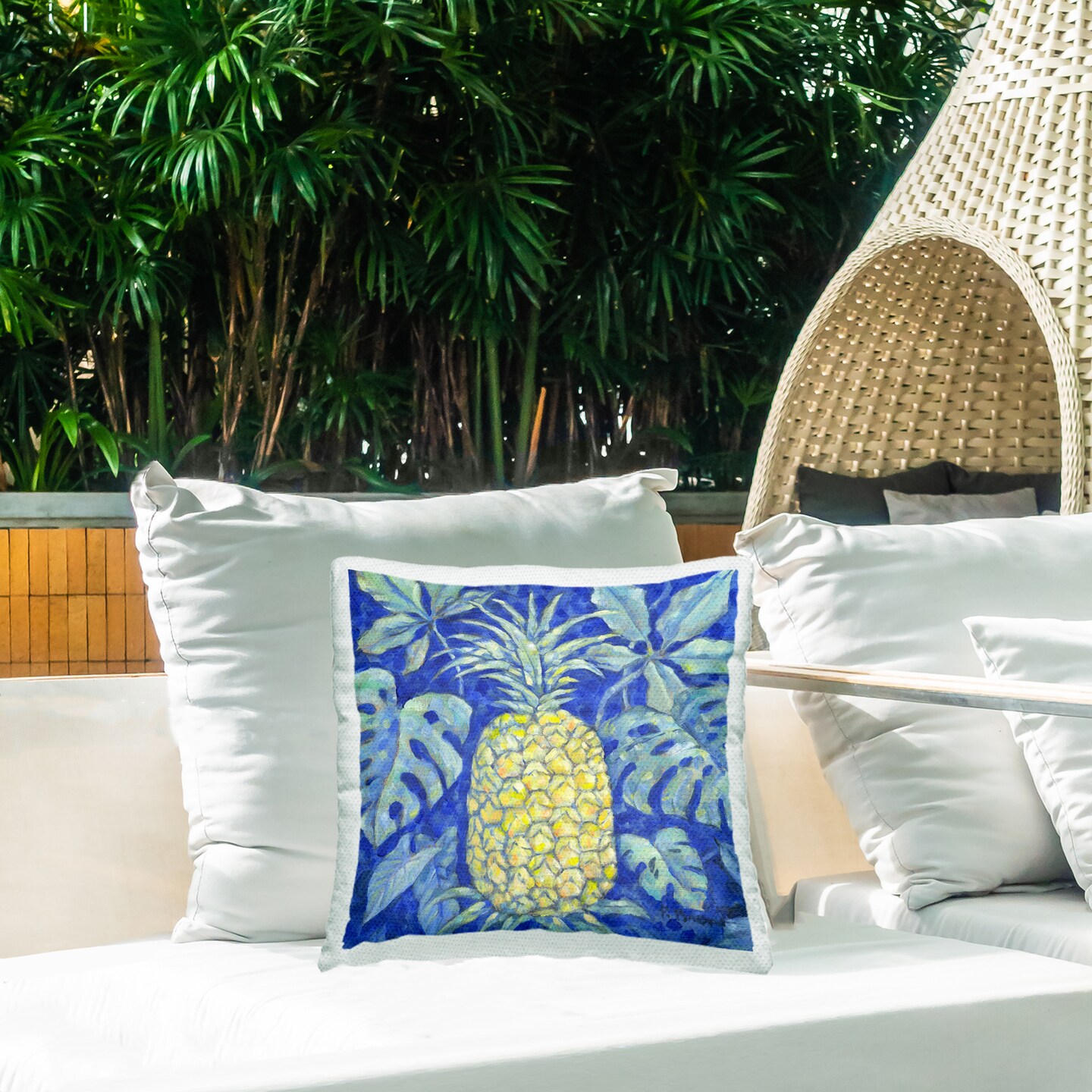 Stupell Industries Tropical Pineapple on Blue Outdoor Printed Pillow design by Paul Brent, 18 x 7 x 18