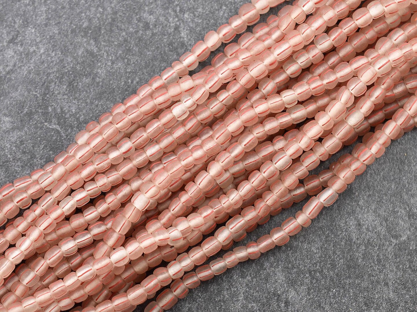 Striped Java Glass Beads. 4-7mm beads. Approx 24&#x22; Strands. 6-7 beads per inch.