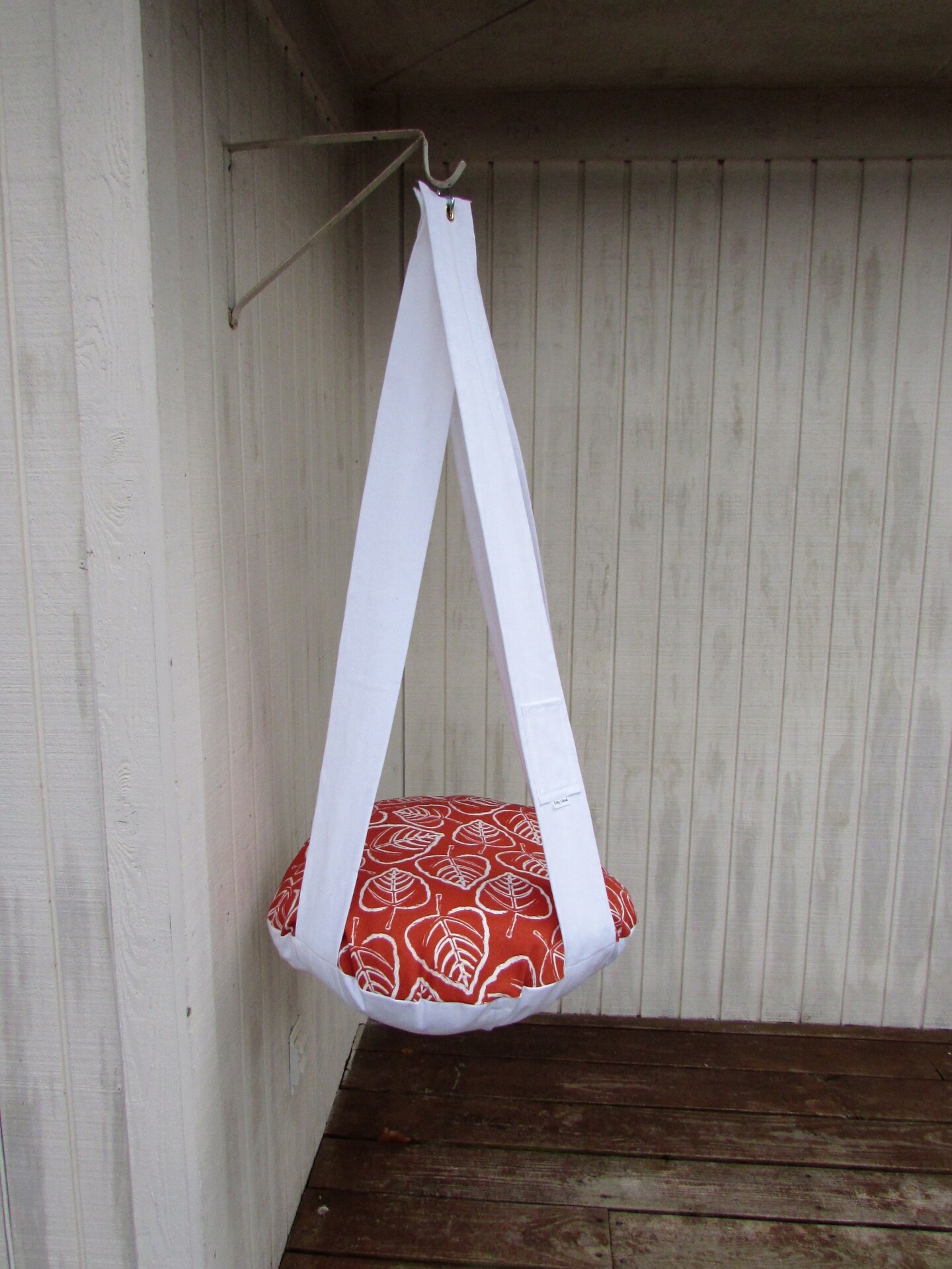 product name is Cat Bed, Rust White Leaf Print, Single Hanging Kitty Cloud