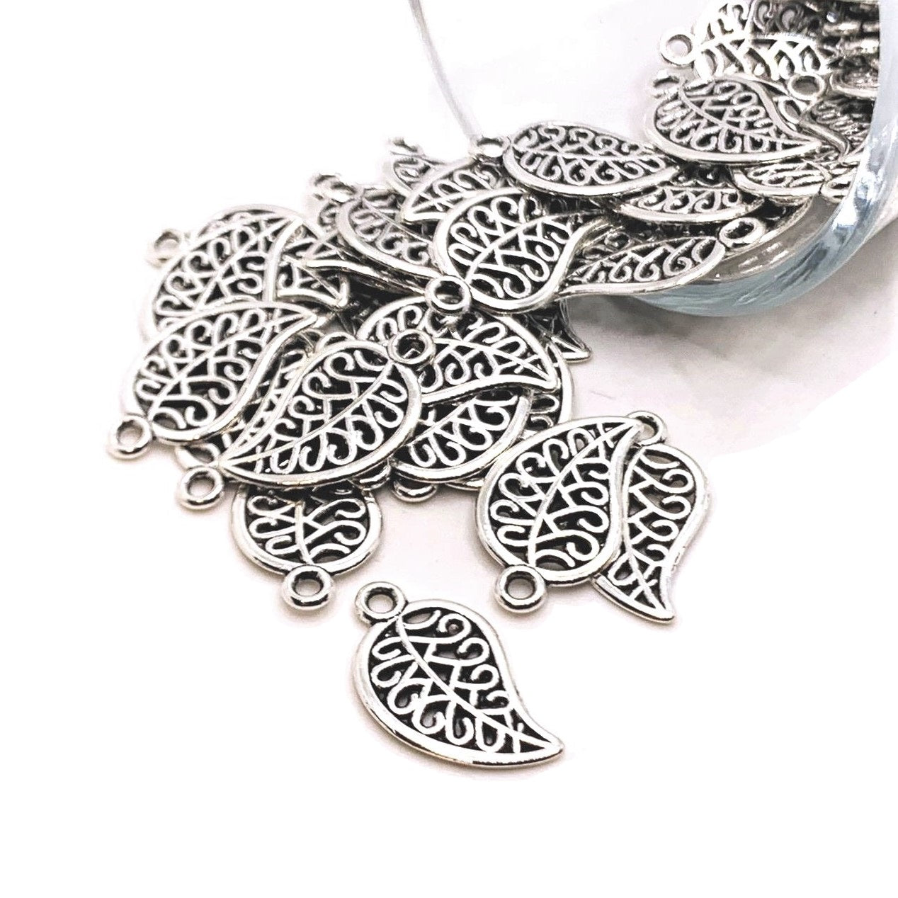 4, 20 or 50 Pieces: Small Scrolled Silver Leaf Charms