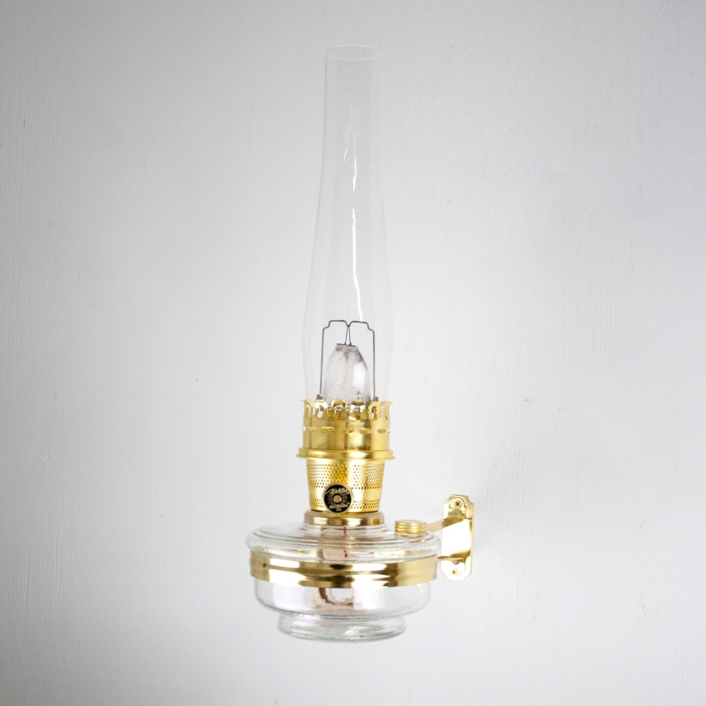 Aladdin Wall Mount Oil Lamp, Genie III Regency Fuel Lighting for Homesteaders or Emergencies, Clear Glass, 18 inches tall, Brass Trim