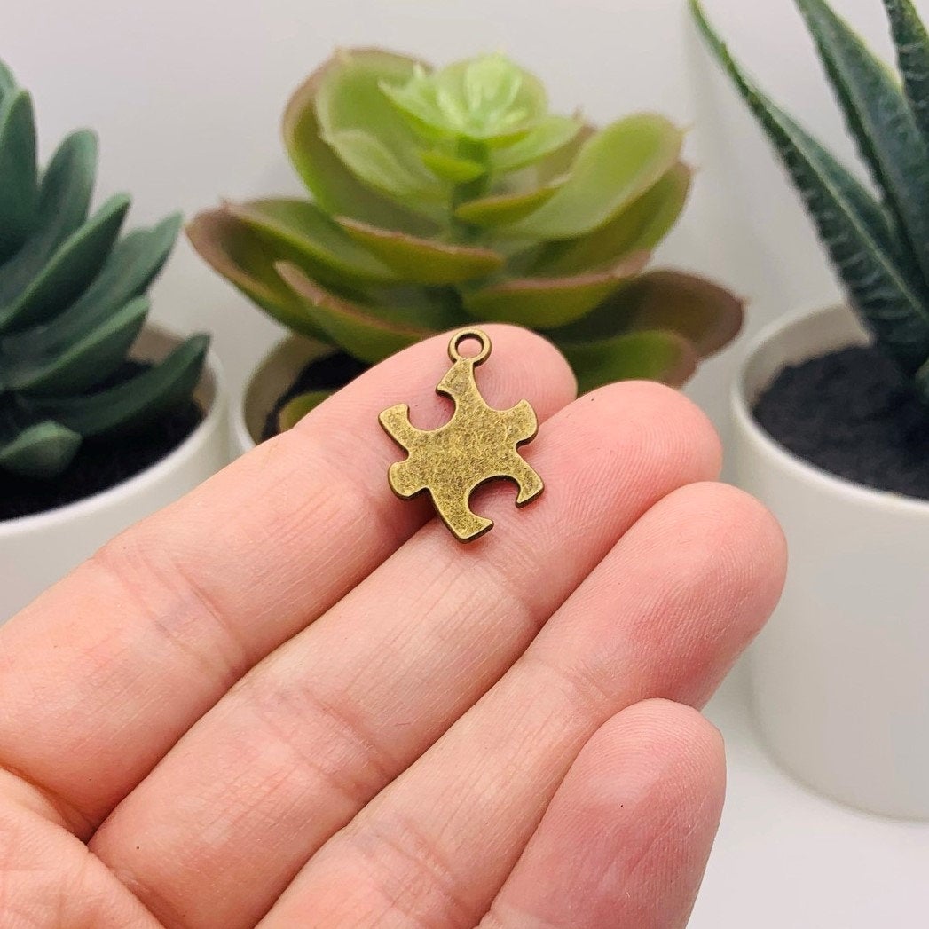 4 or 20 Pieces: Bronze Autism Awareness Puzzle Piece Charms