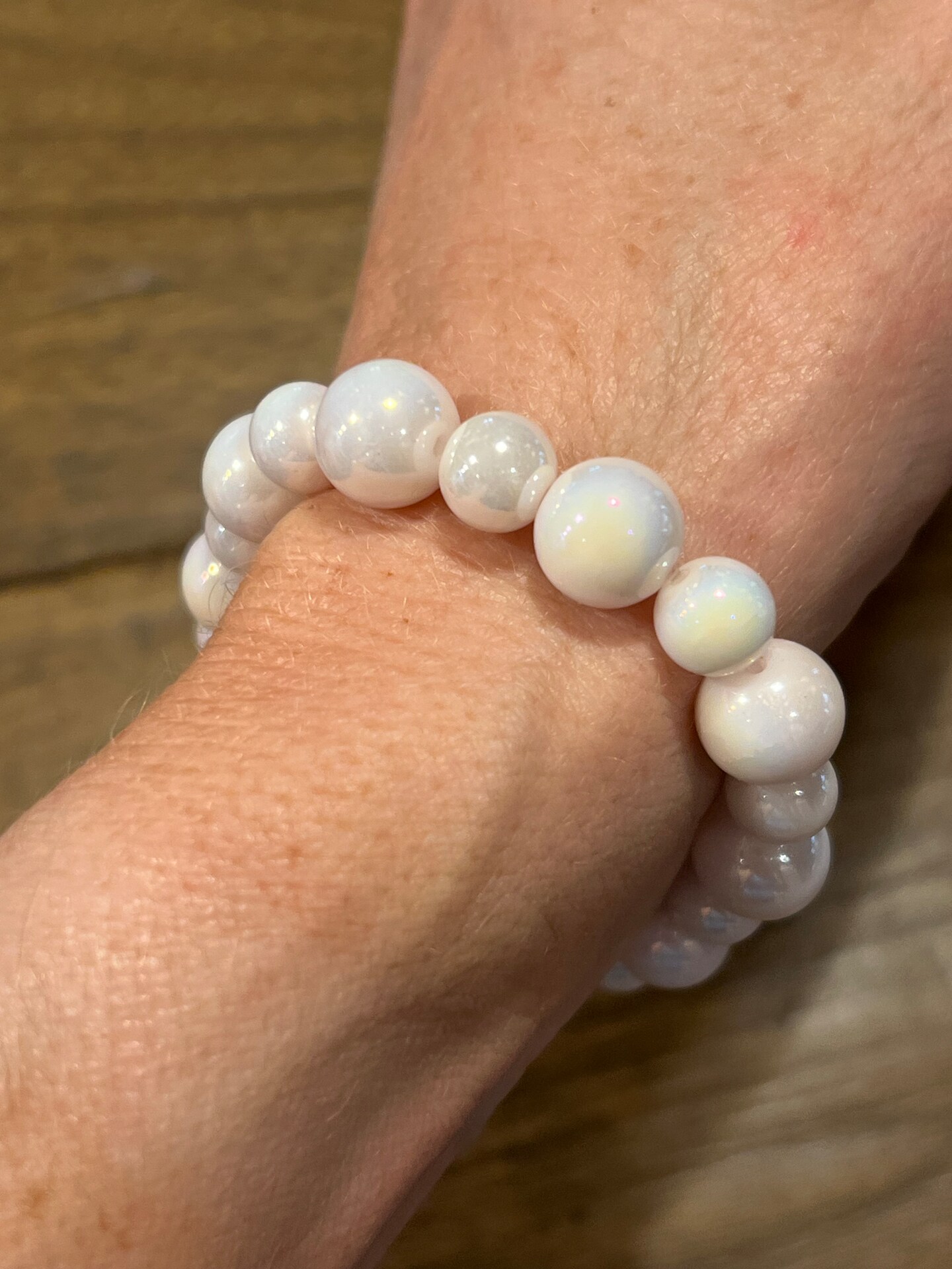White Iridescent Bead Stretch Bracelet | MakerPlace by Michaels display picture 2